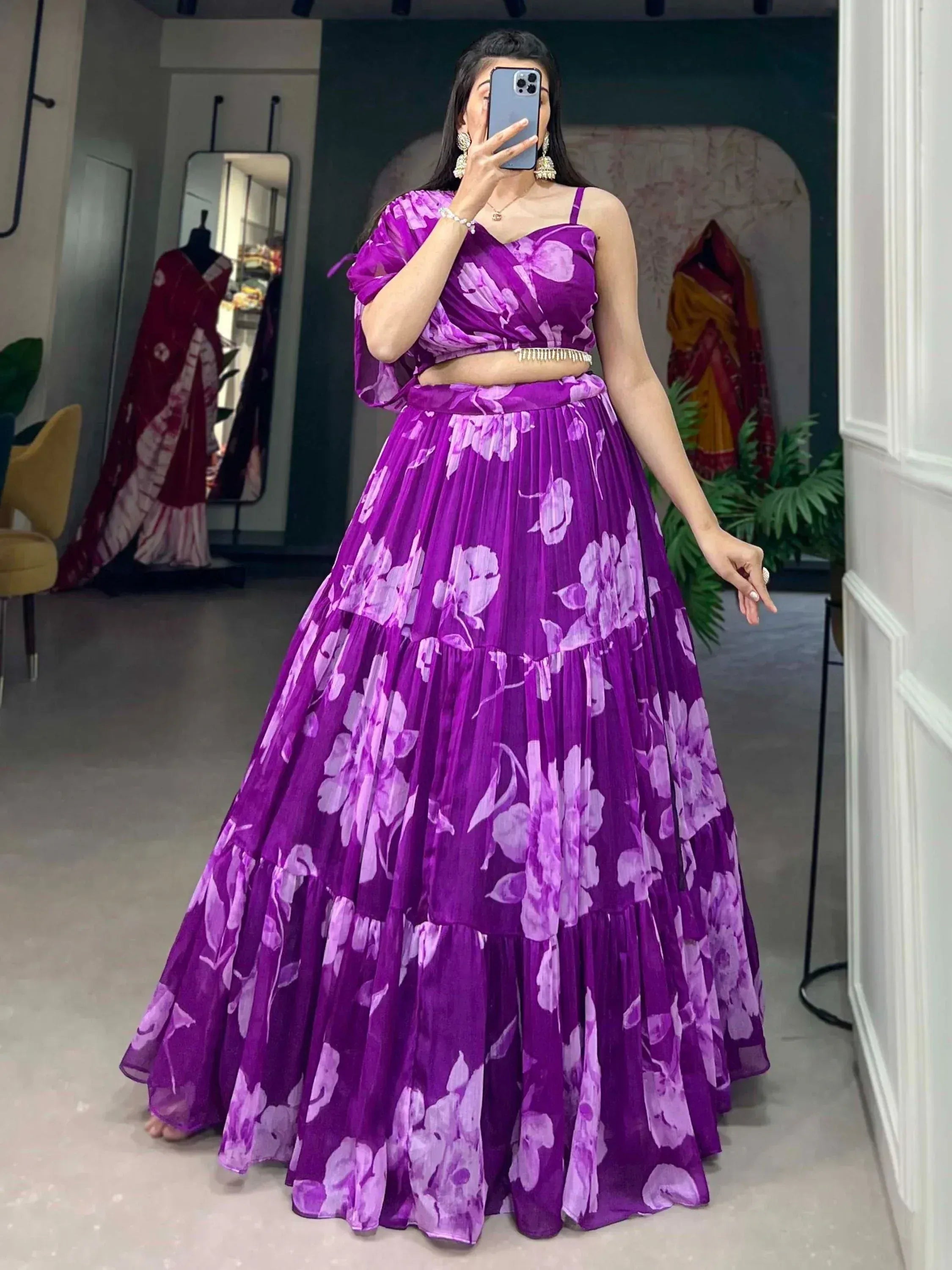 Purple floral lehenga choli with pleated skirt and spaghetti top, perfect for Indian ethnic occasions