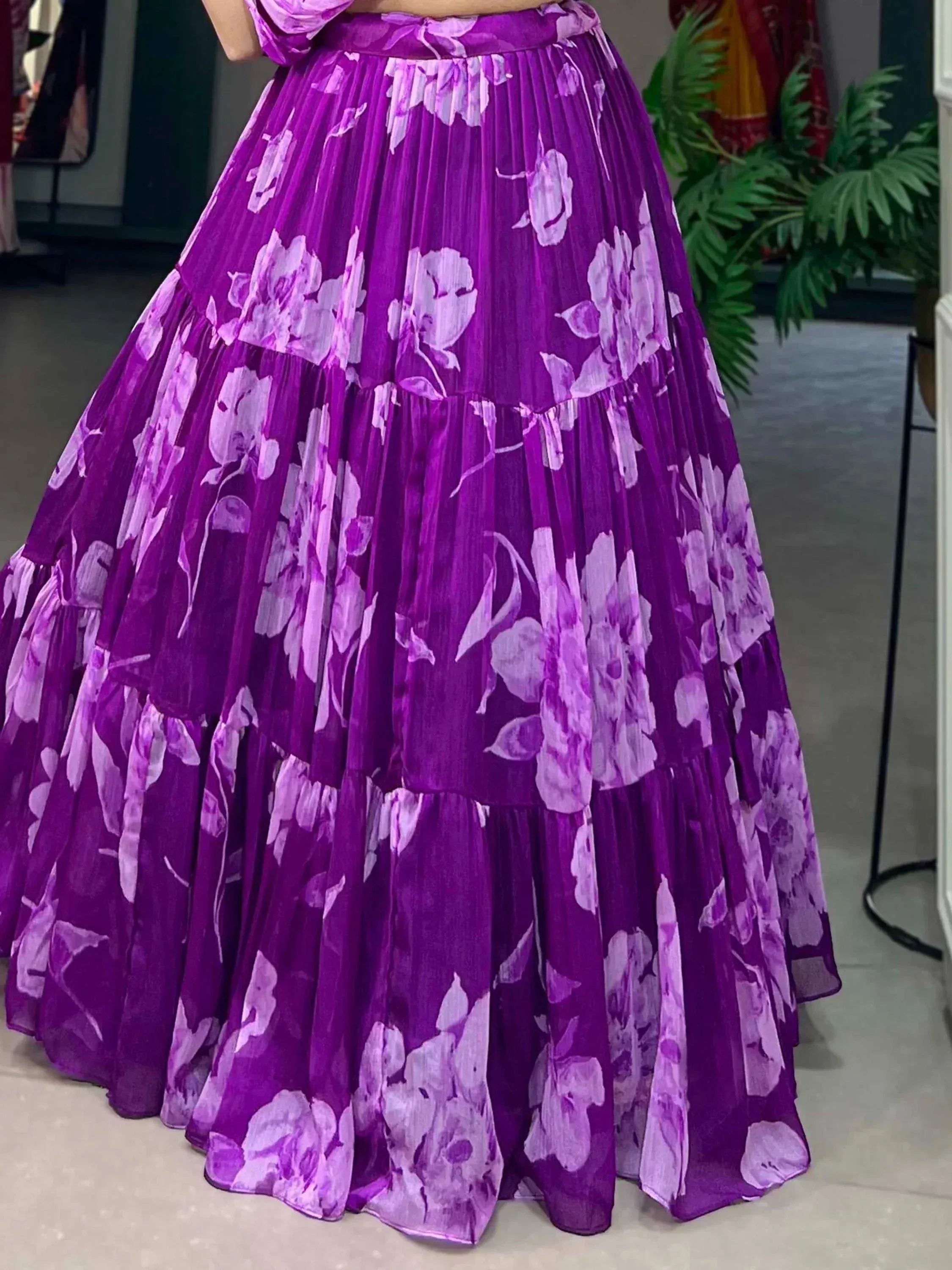 Purple floral pleated lehenga skirt with layered design, perfect for ethnic wear occasions
