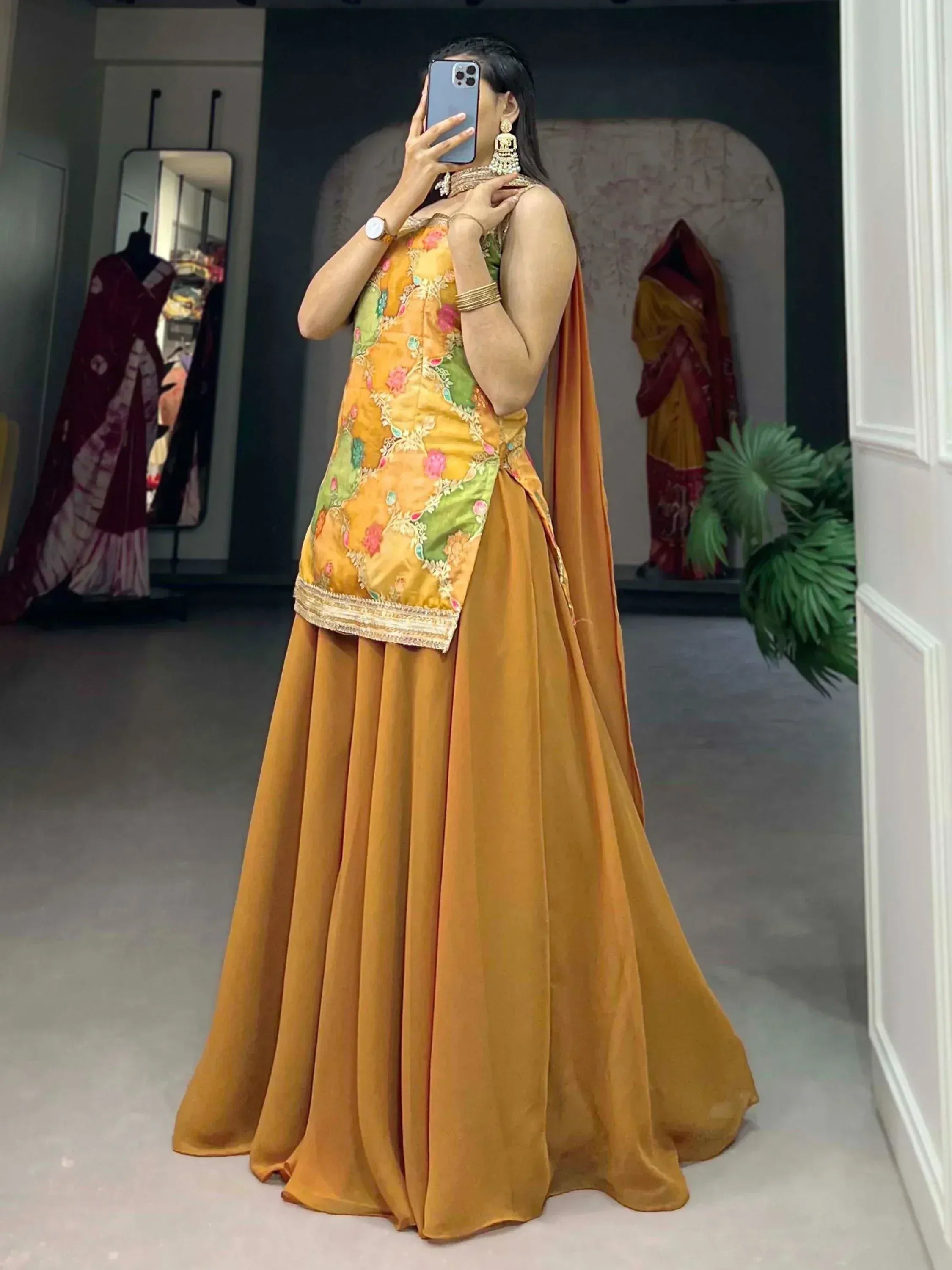 Woman in mustard yellow floral embroidered lehenga choli with dupatta, Indian ethnic wear