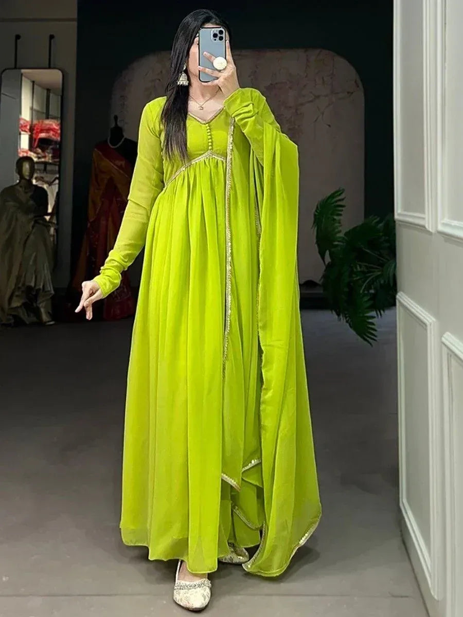 Vibrant lime green ethnic gown with gold trim, perfect for Indian festive occasions and parties.