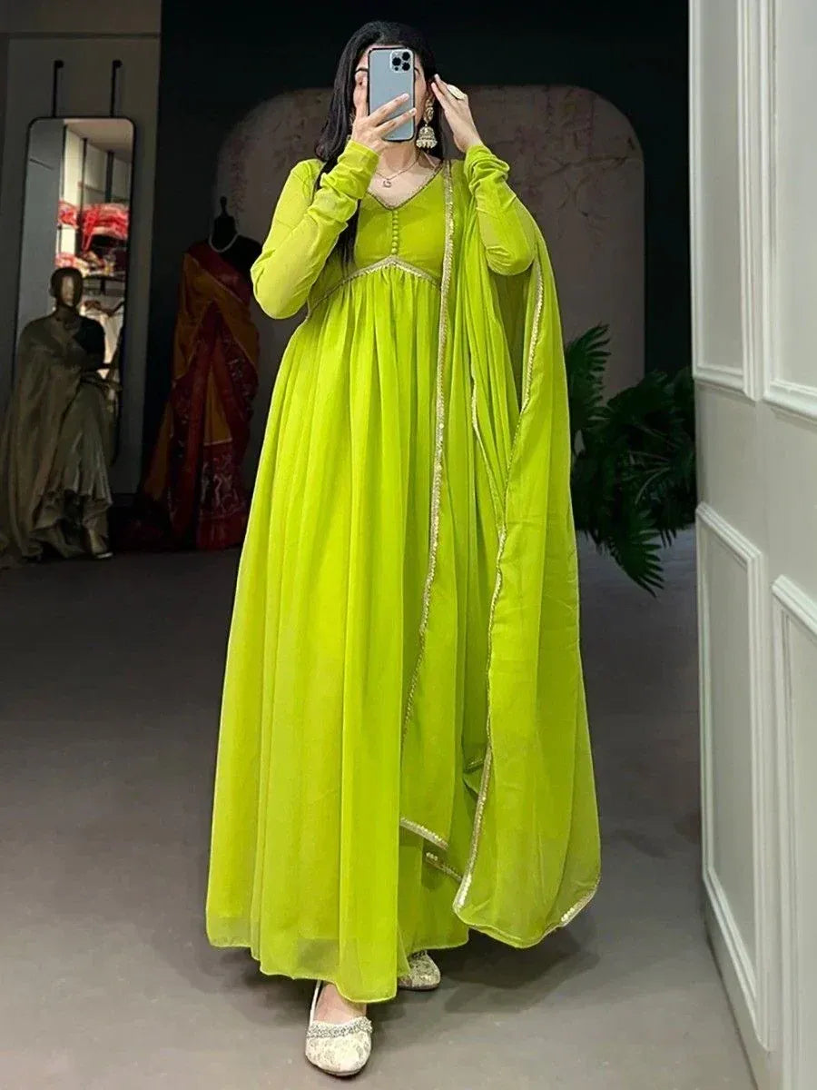 Vibrant lime green ethnic gown with gold trim, perfect for Indian festive occasions and weddings.