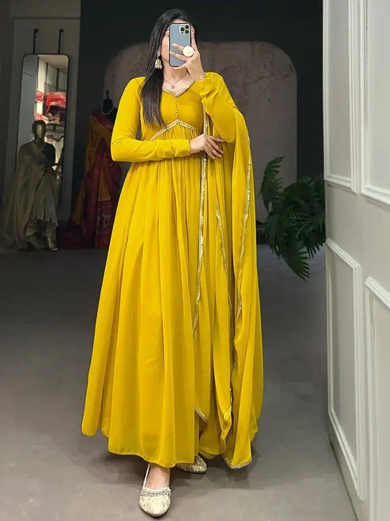 Fascinating Yellow Georgette Festival Wear Plain Gown With Dupatta