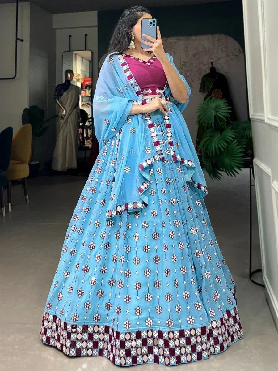 Blue floral lehenga choli with maroon border, perfect for Indian ethnic occasions