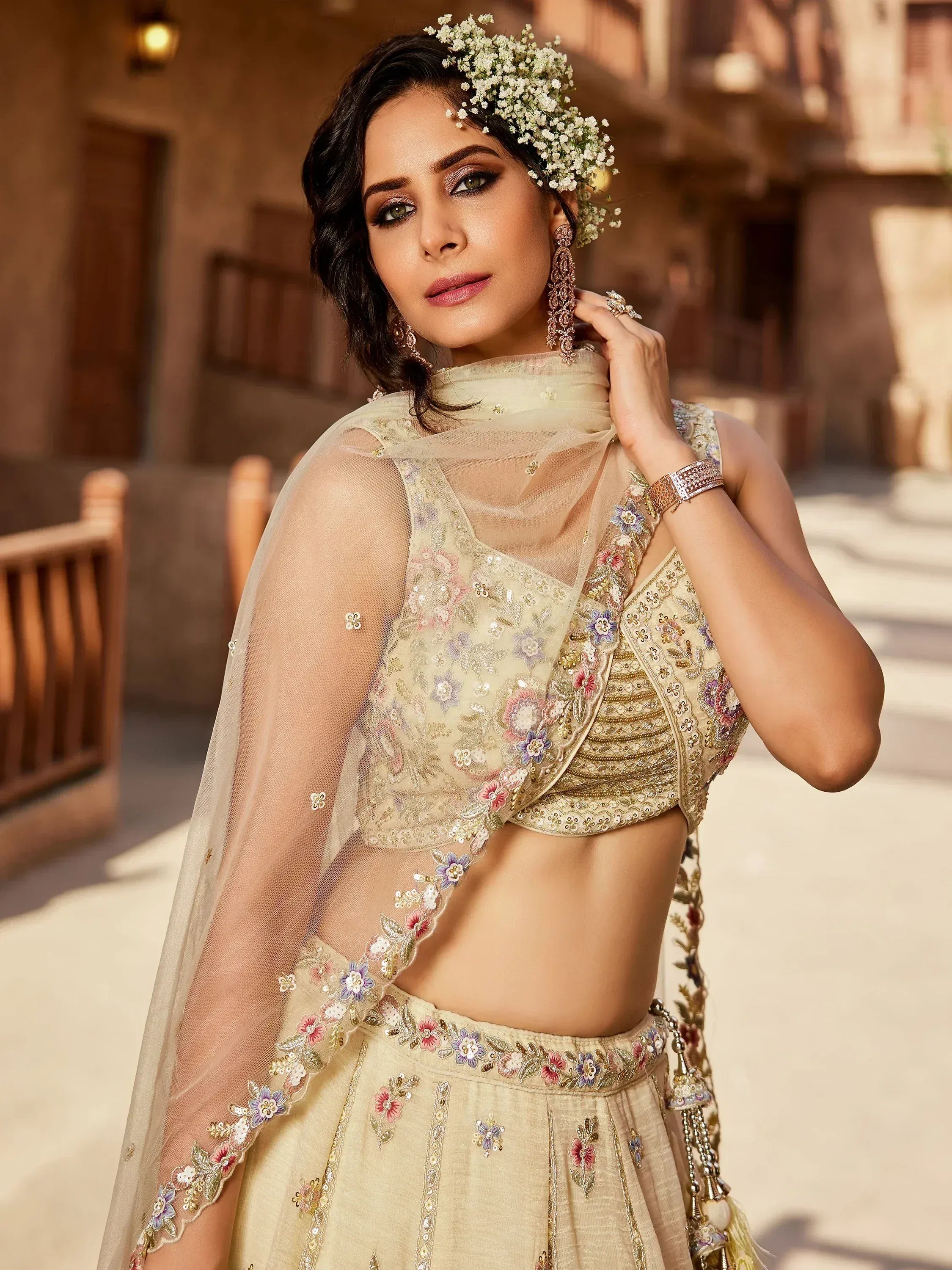 Elegant floral embroidered lehenga choli with sheer dupatta, perfect for Indian ethnic occasions.