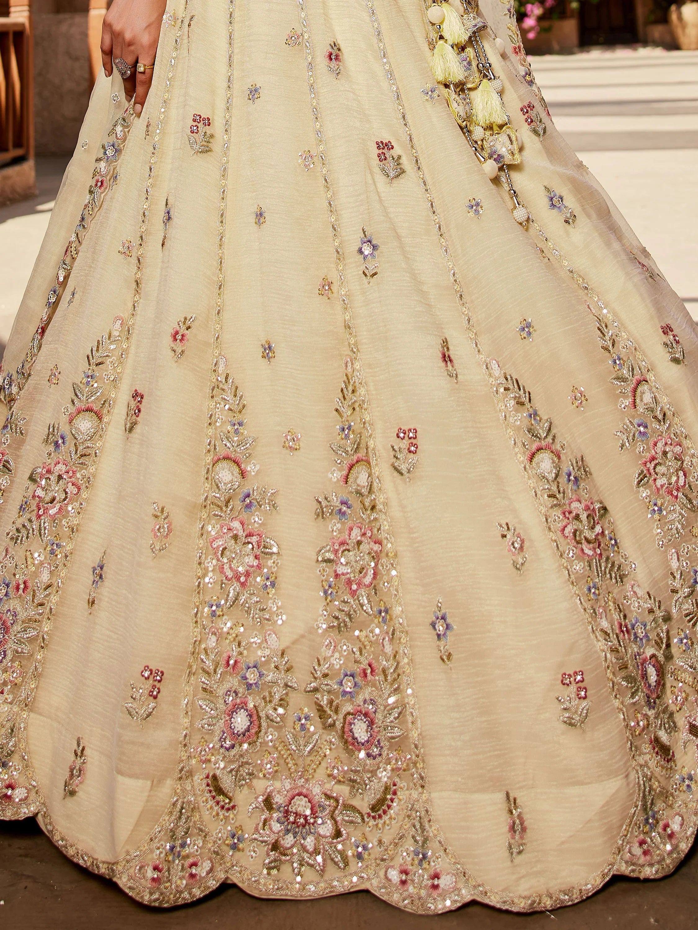 Cream designer lehenga with floral embroidery and tassels, Indian ethnic wear