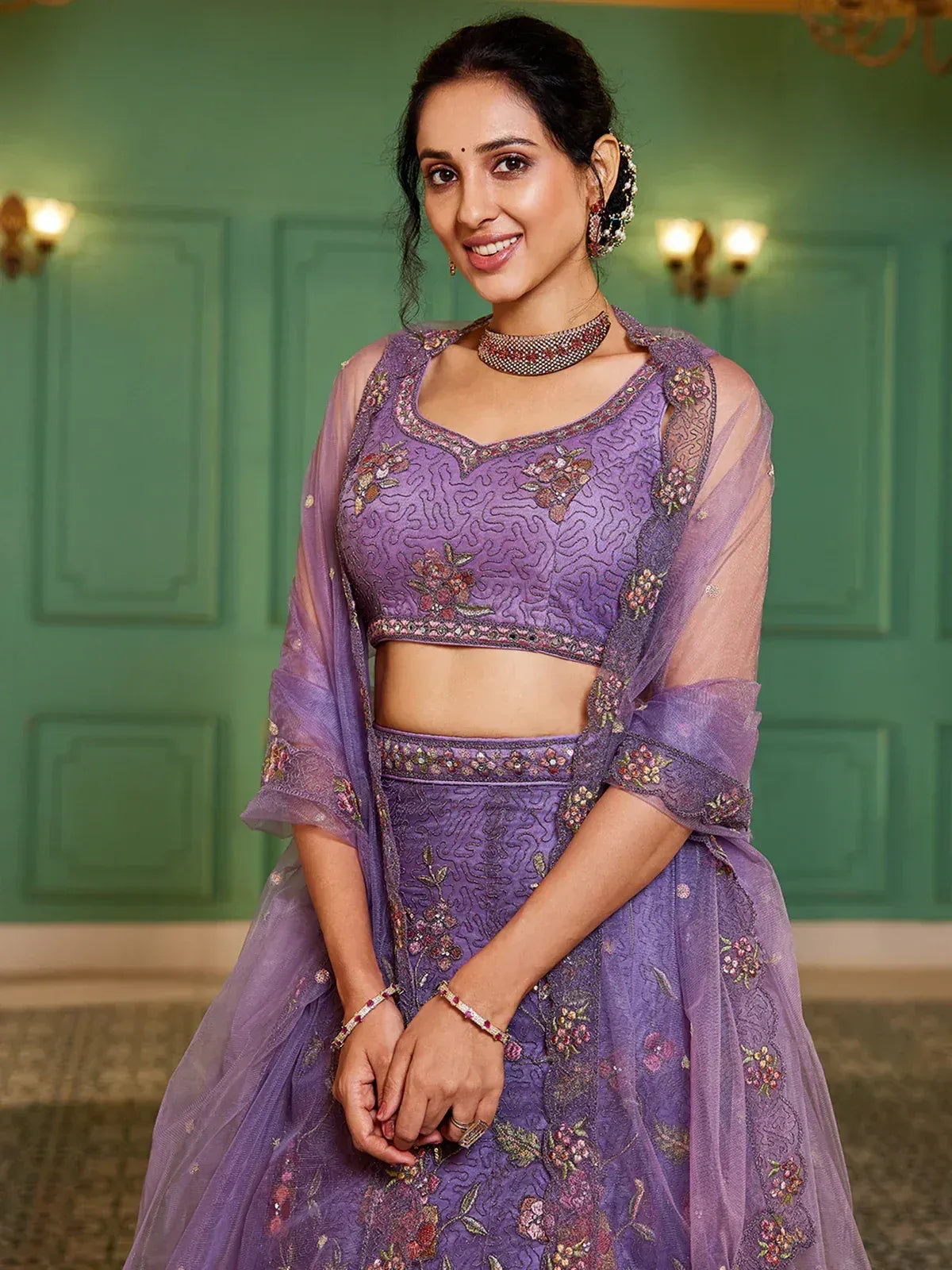Purple floral embroidered lehenga choli with sheer dupatta, perfect for Indian ethnic wear occasions.