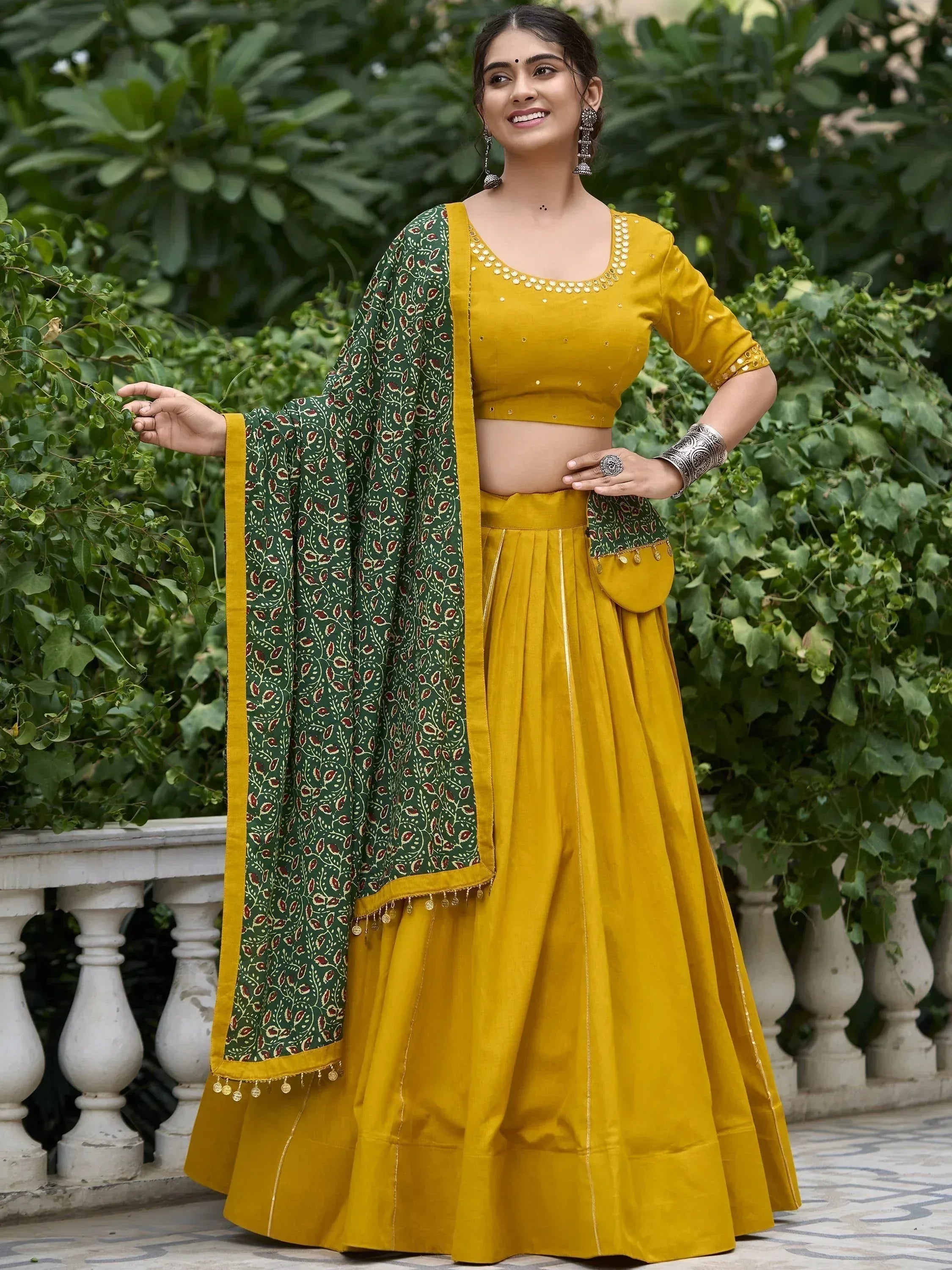 Mustard yellow lehenga choli with green printed dupatta, ethnic Indian wear for women