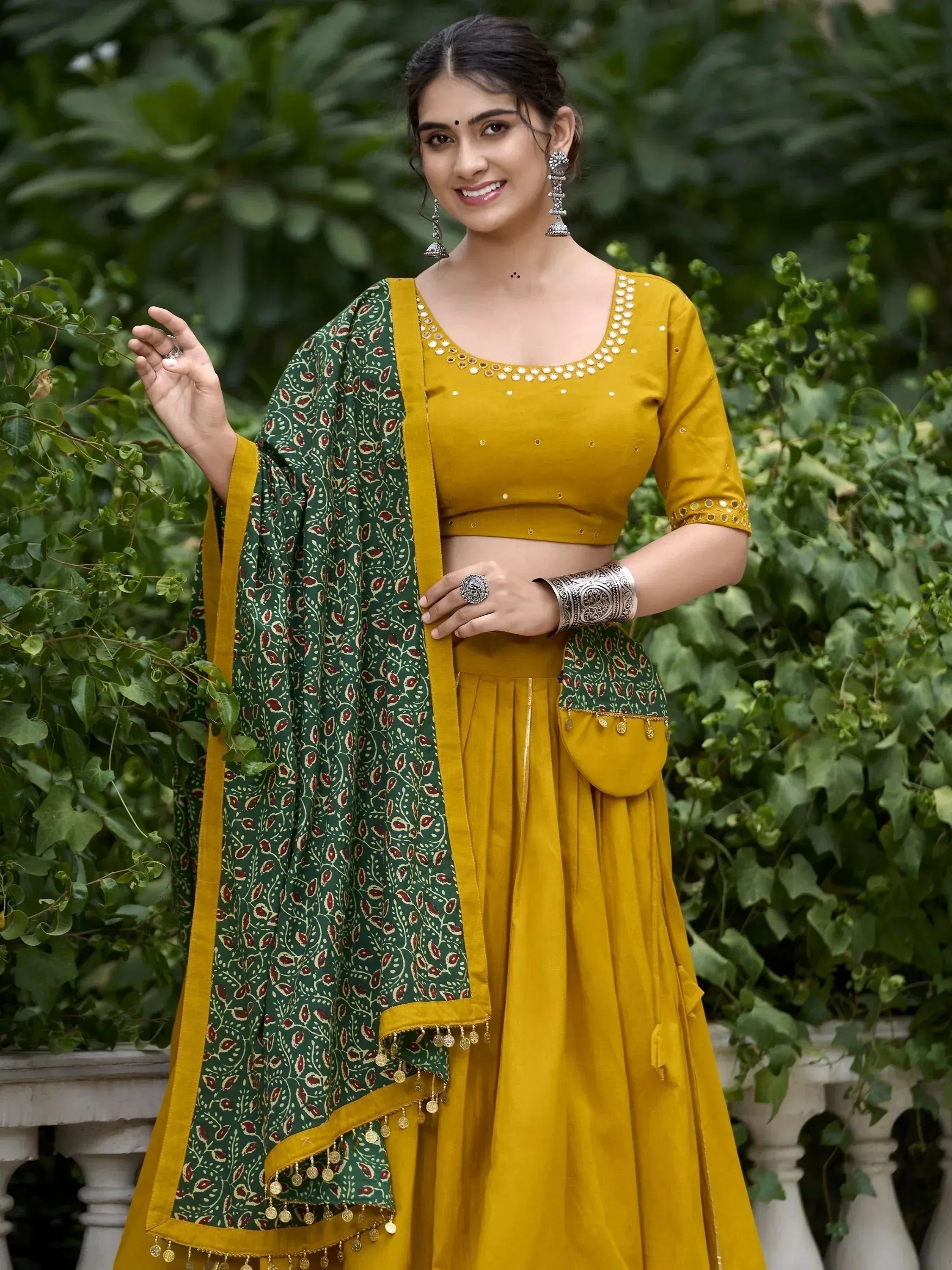 Mustard yellow lehenga choli with green printed dupatta, ethnic Indian wear for women