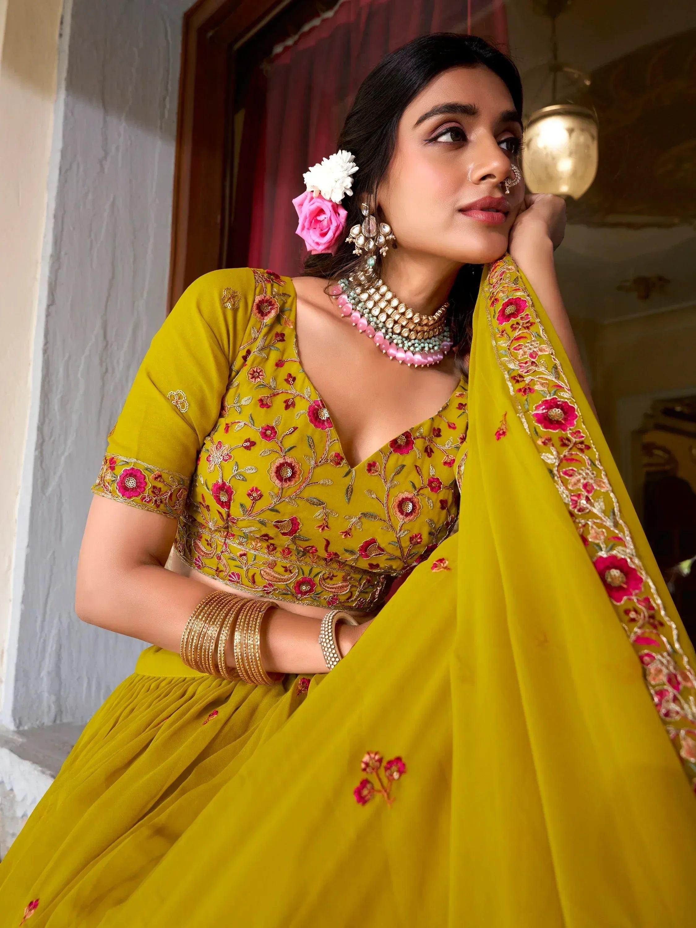 Yellow floral embroidered lehenga choli with matching dupatta, perfect for Indian ethnic wear occasions