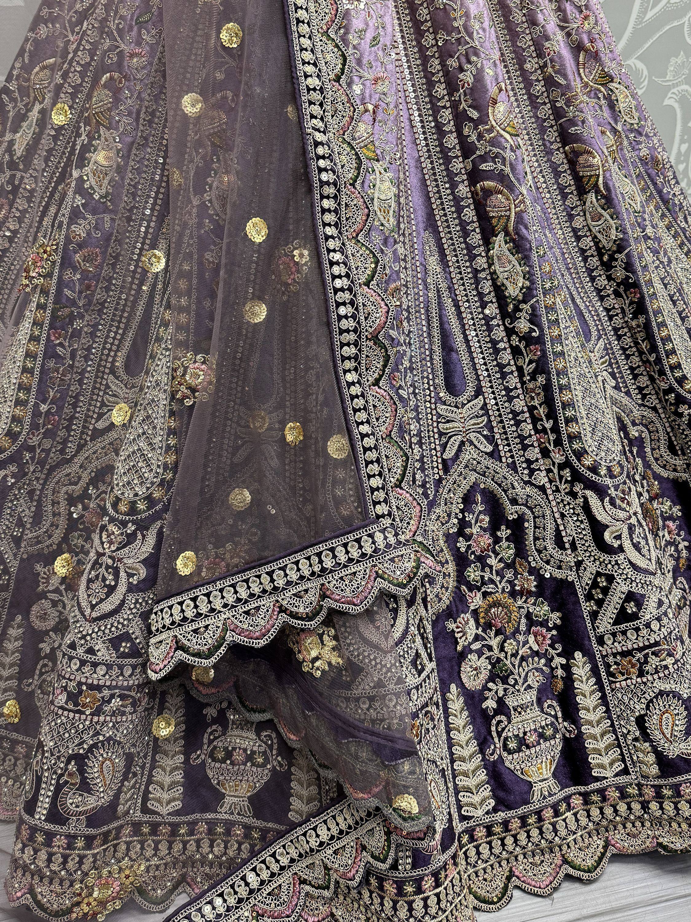 Purple embroidered lehenga with gold sequins and floral motifs, perfect for Indian ethnic wear occasions