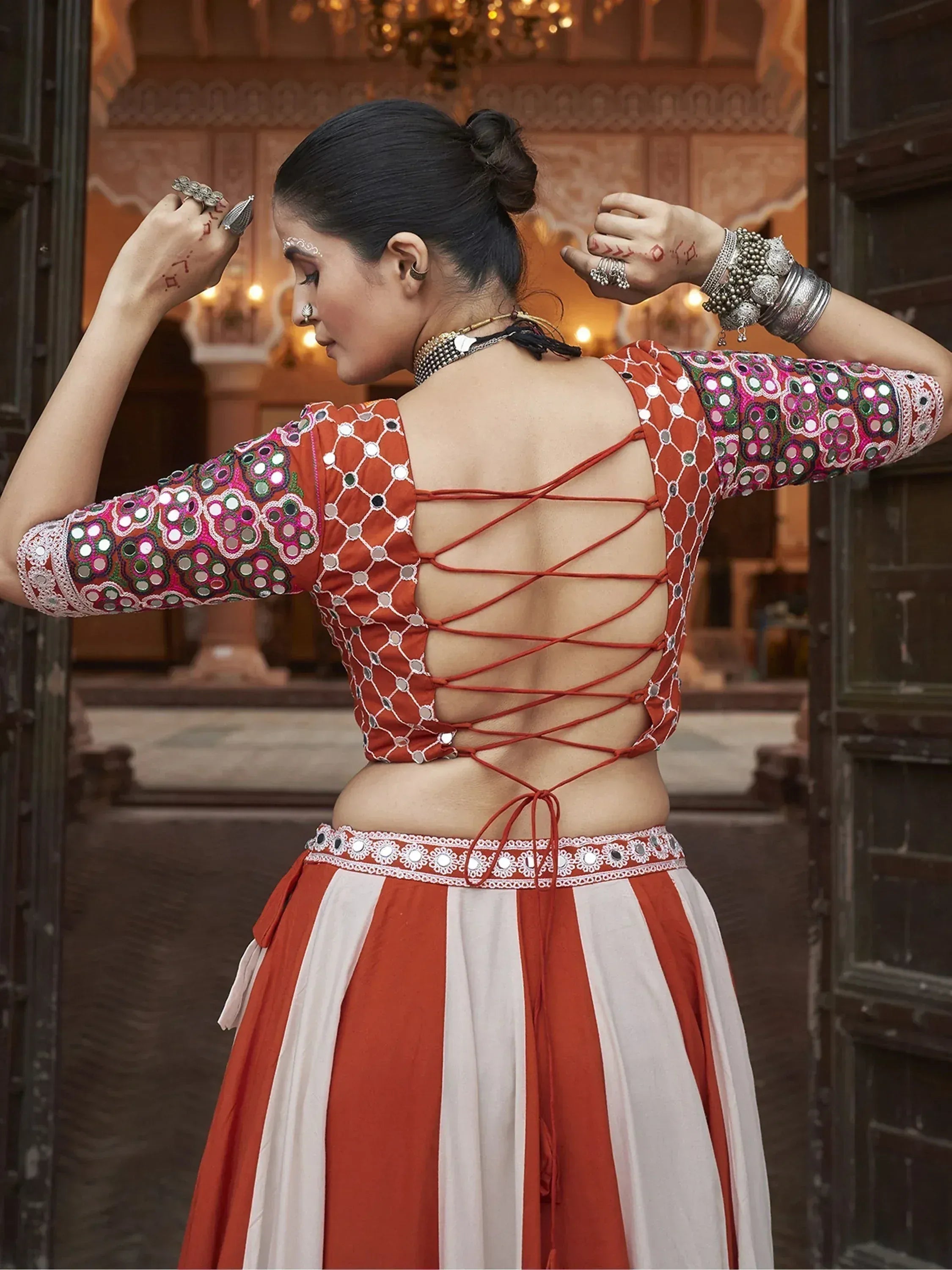 Orange and white mirror work lehenga choli with crisscross back, ethnic Indian wear