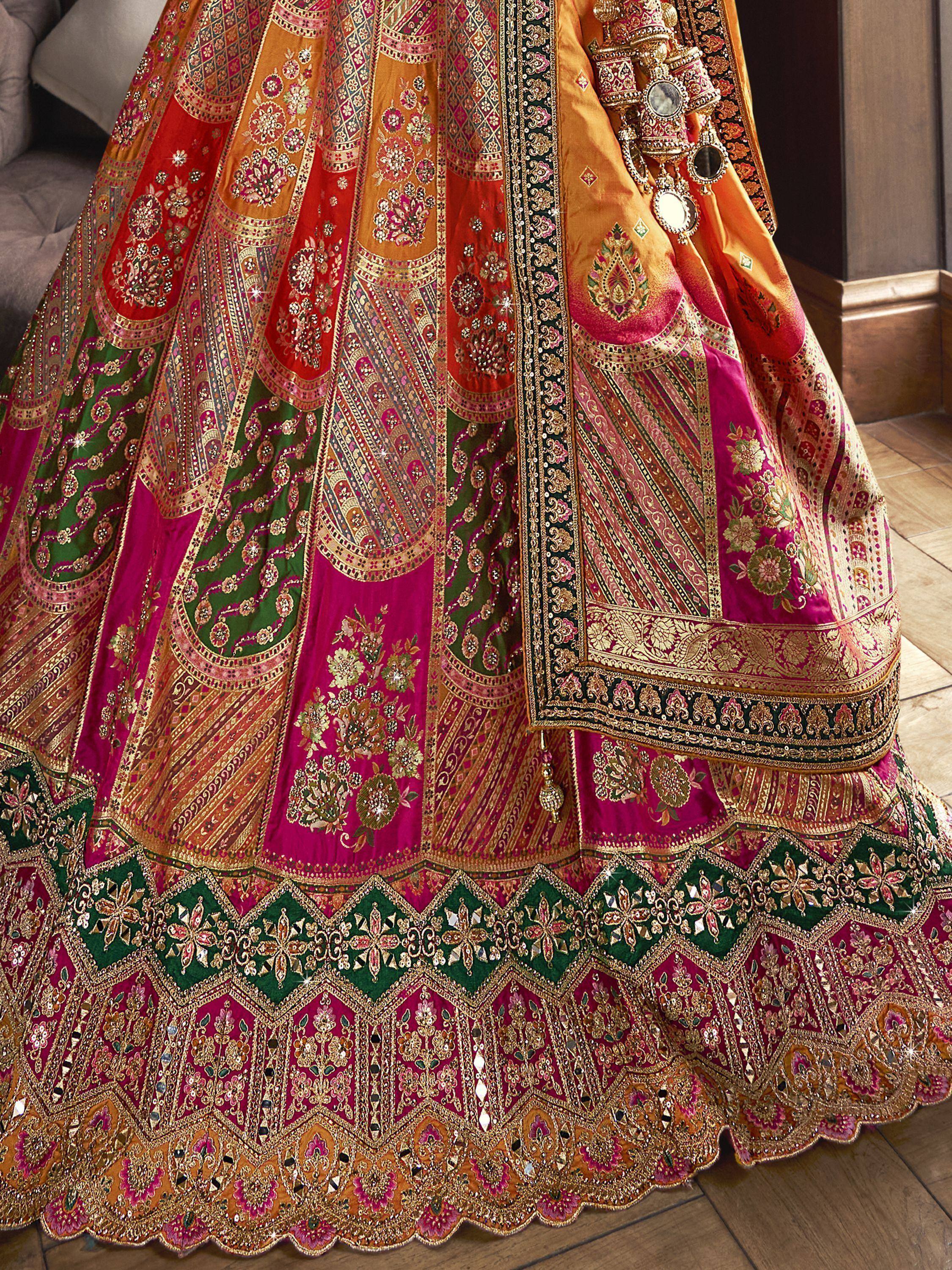 Luxury Indian lehenga choli with intricate embroidery, mirror work, and vibrant colors for weddings and festivals