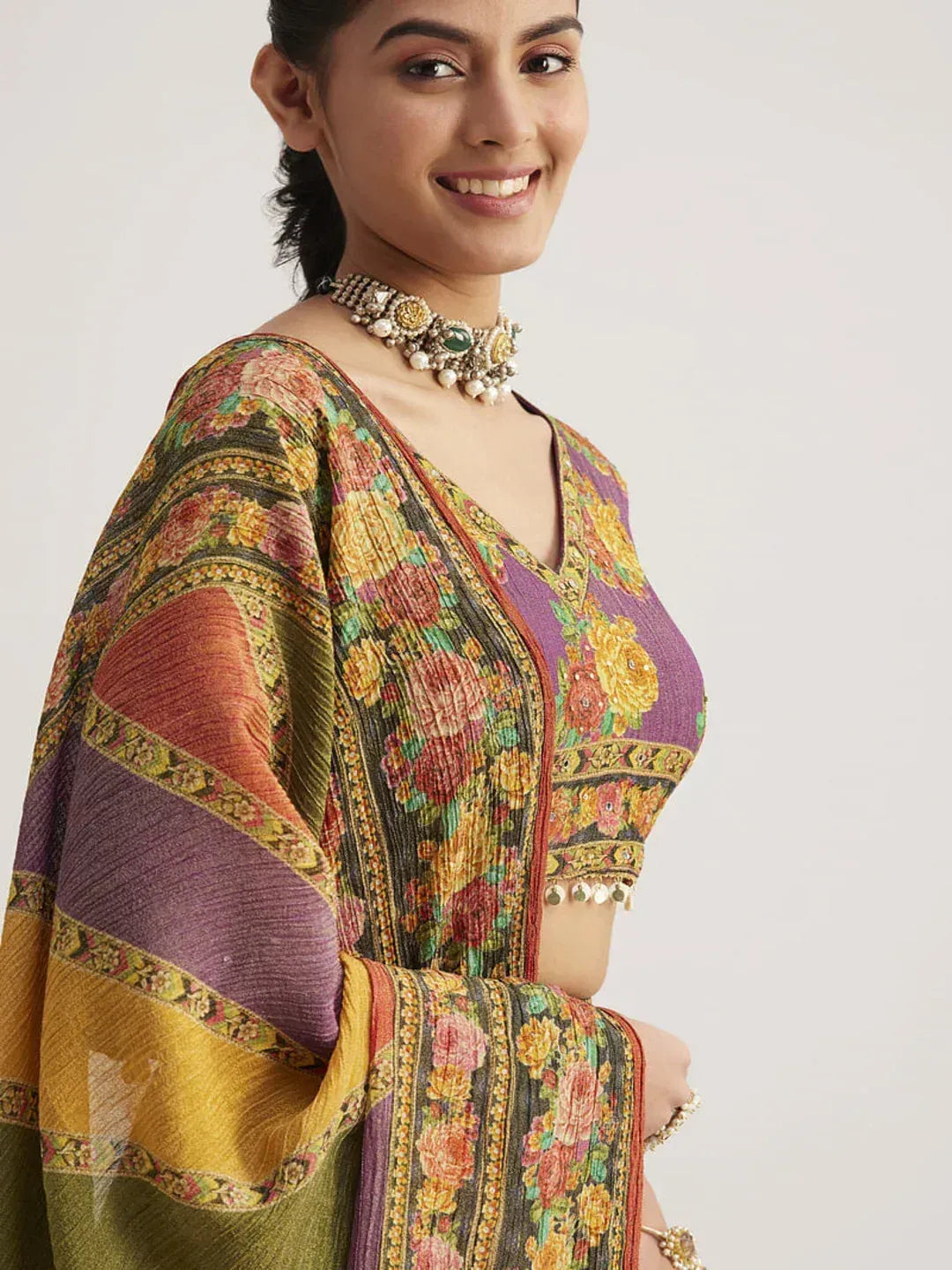 Floral printed Indian ethnic top with V-neck and colorful border, paired with statement jewelry