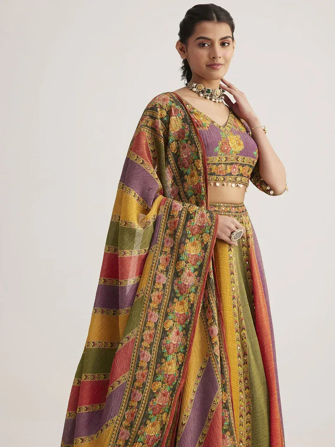 Colorful floral lehenga choli with embroidered blouse and dupatta, perfect for Indian ethnic occasions