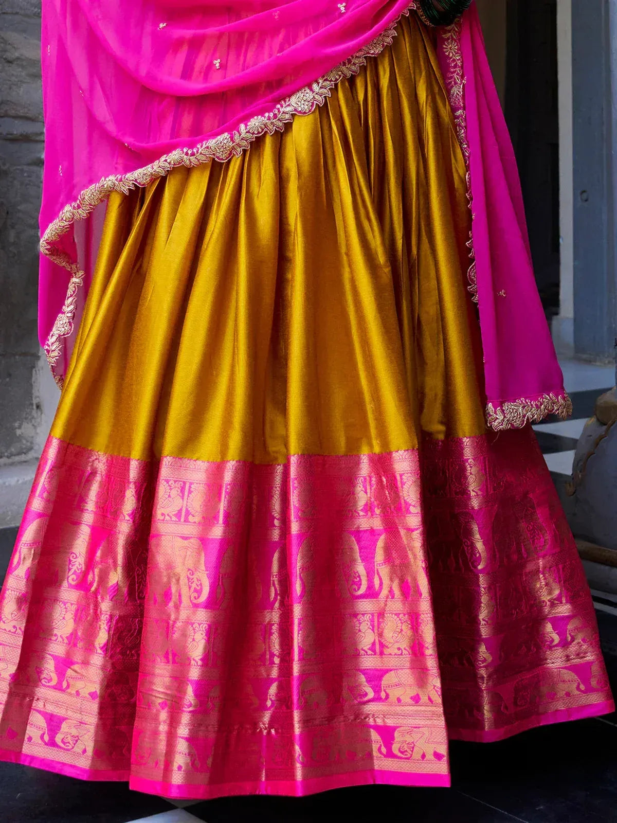 Golden lehenga with pink elephant border and matching dupatta, Indian ethnic wear