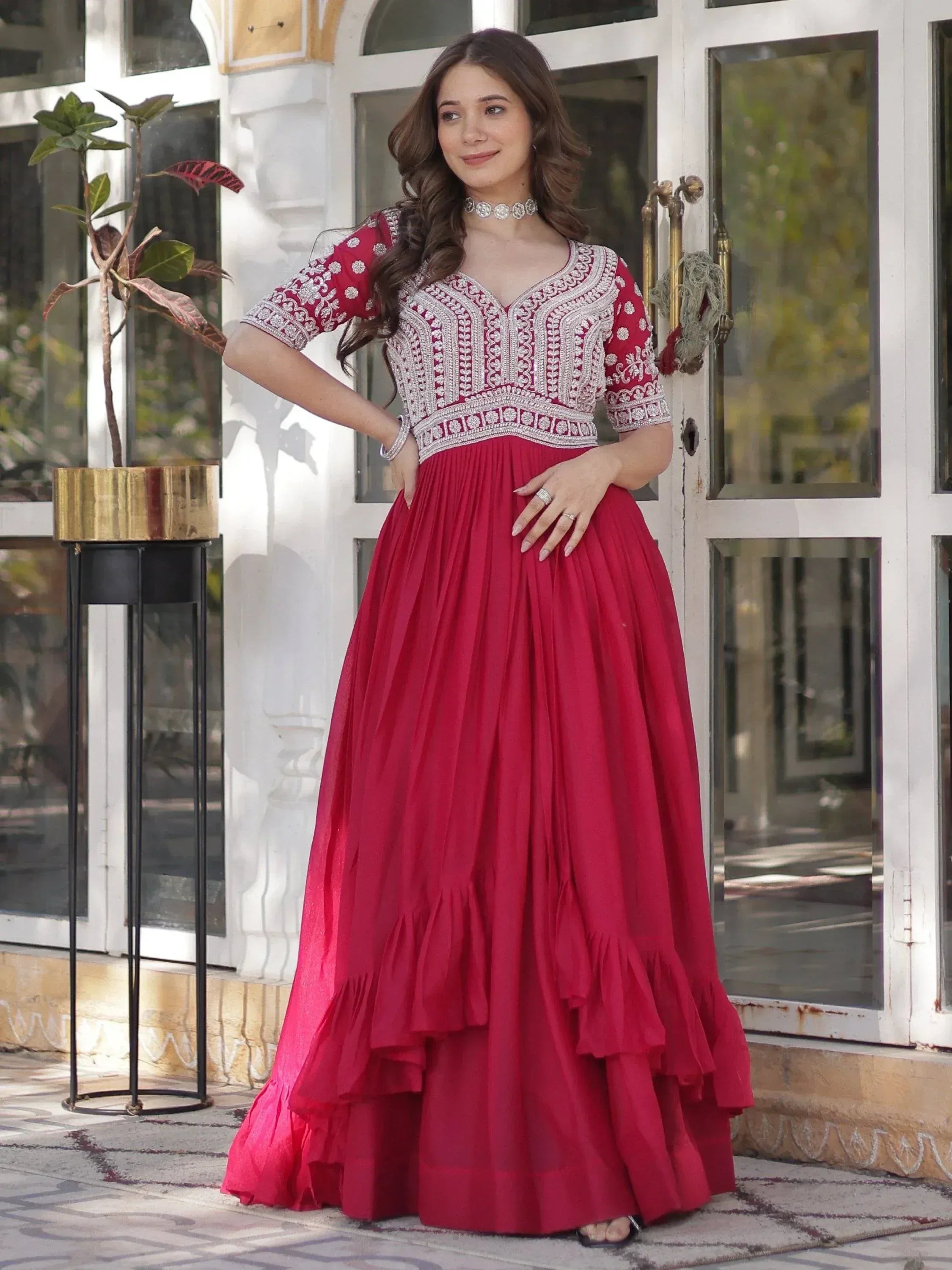 Red embroidered ethnic gown with pleated skirt, perfect for Indian occasions and festive wear