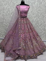 Lovely Pink Sequins Net Bridesmaid Lehenga Choli With Dupatta