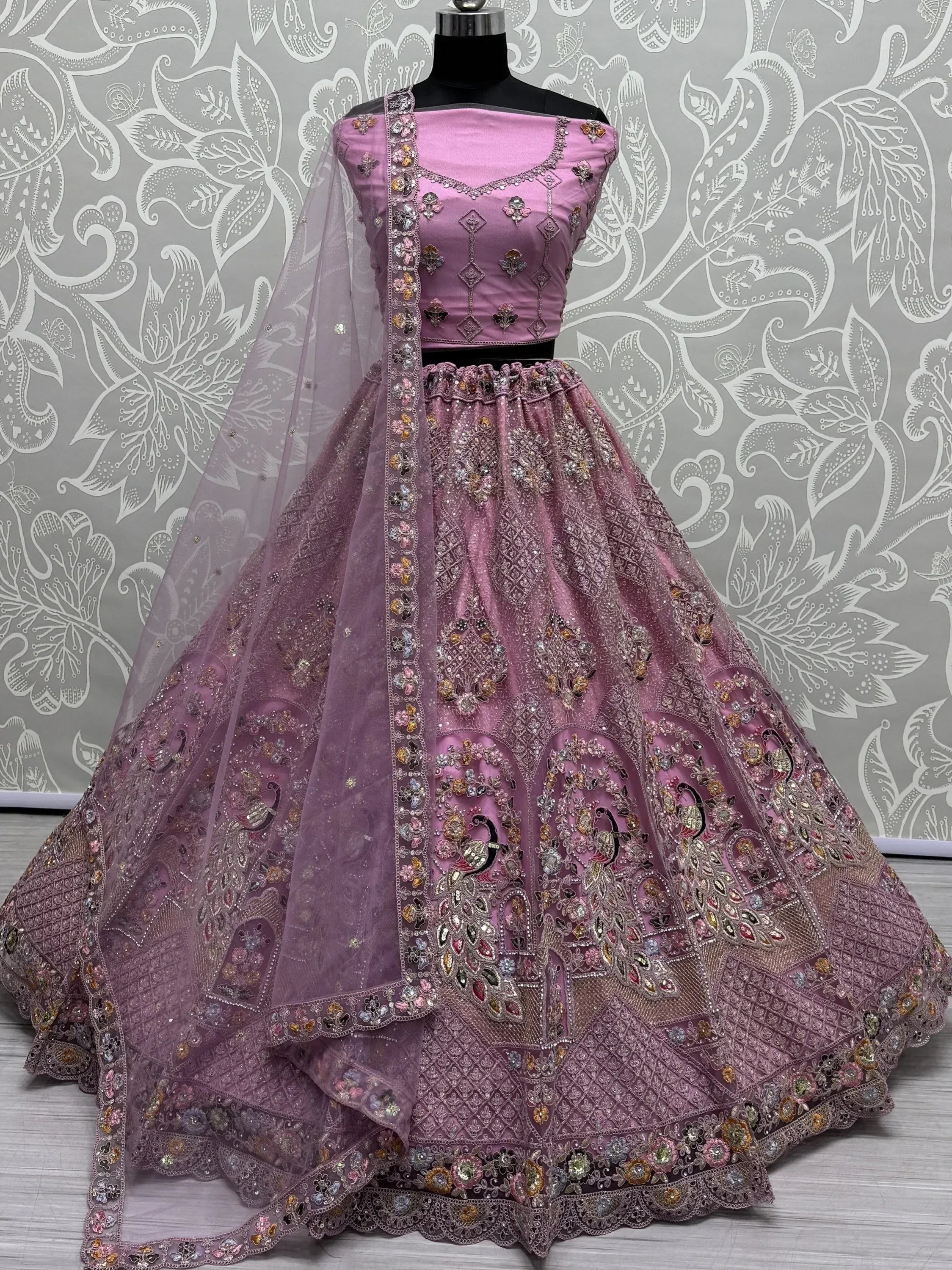 Pink designer lehenga choli with peacock embroidery and net dupatta, ethnic Indian wear