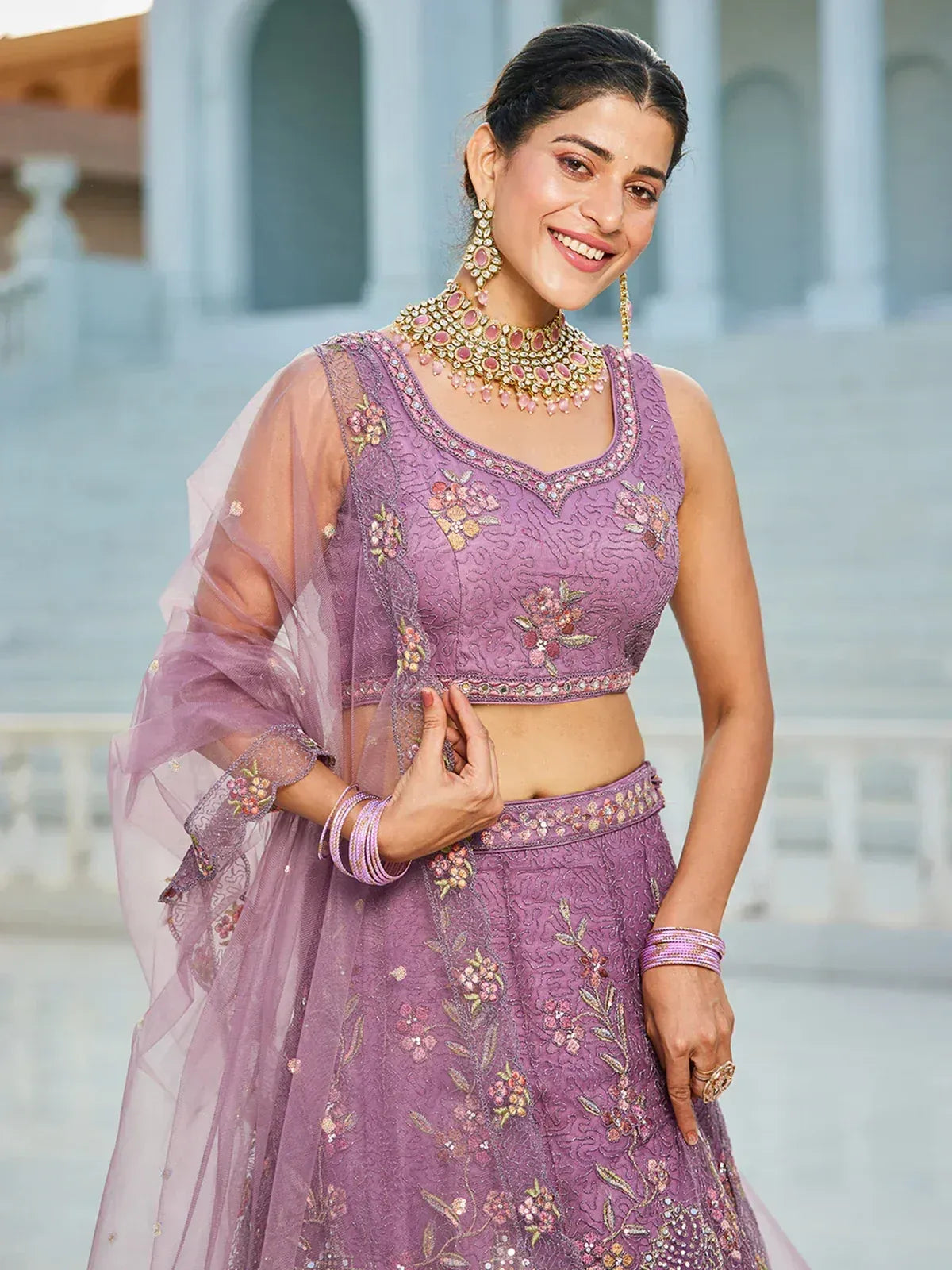Purple floral embroidered lehenga choli with sheer dupatta, perfect for Indian ethnic wear occasions
