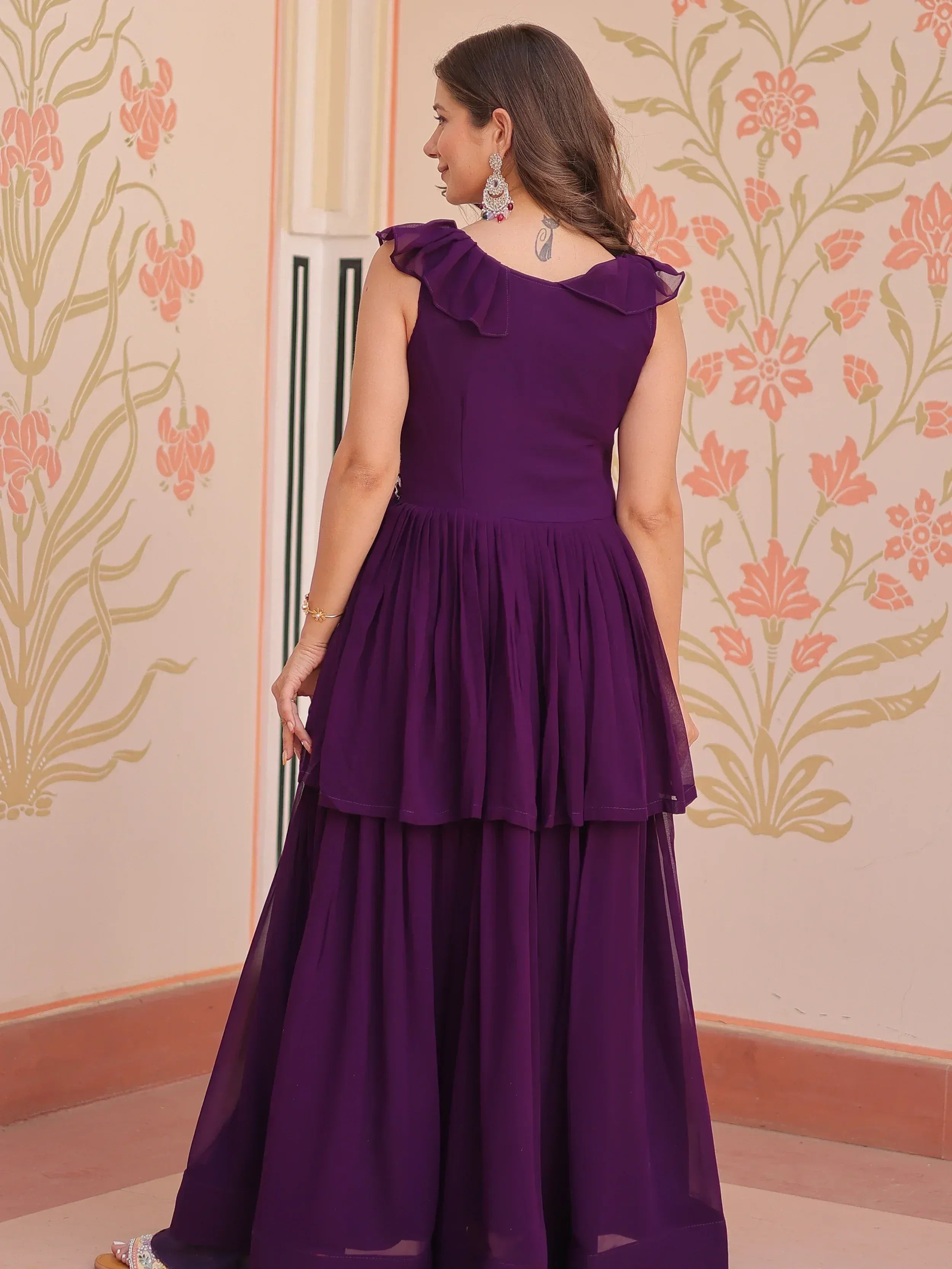 Purple ethnic gown with ruffle shoulders and layered skirt, perfect for Indian occasions