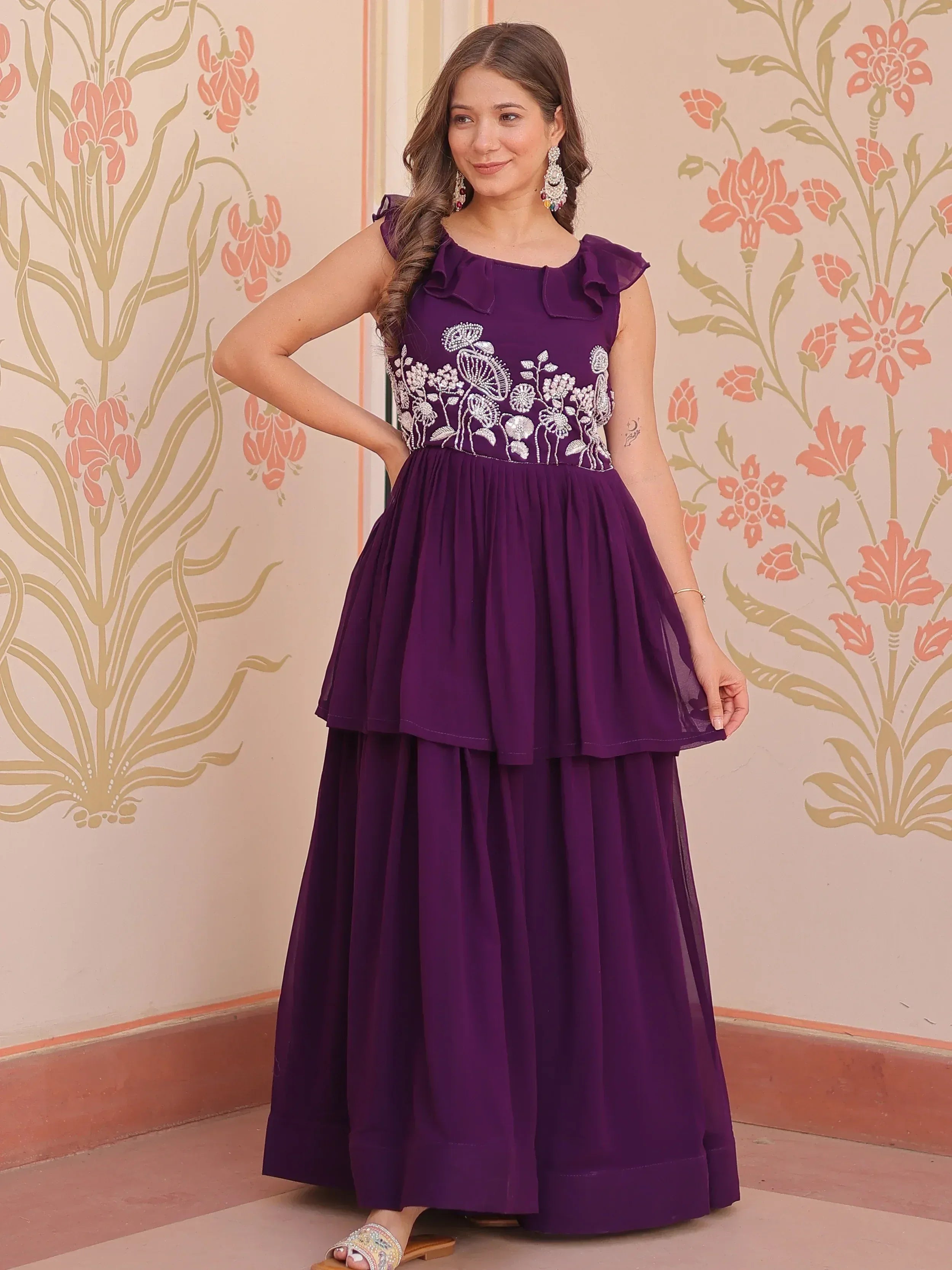 Purple ethnic gown with floral embroidery and ruffle sleeves, perfect for Indian occasions