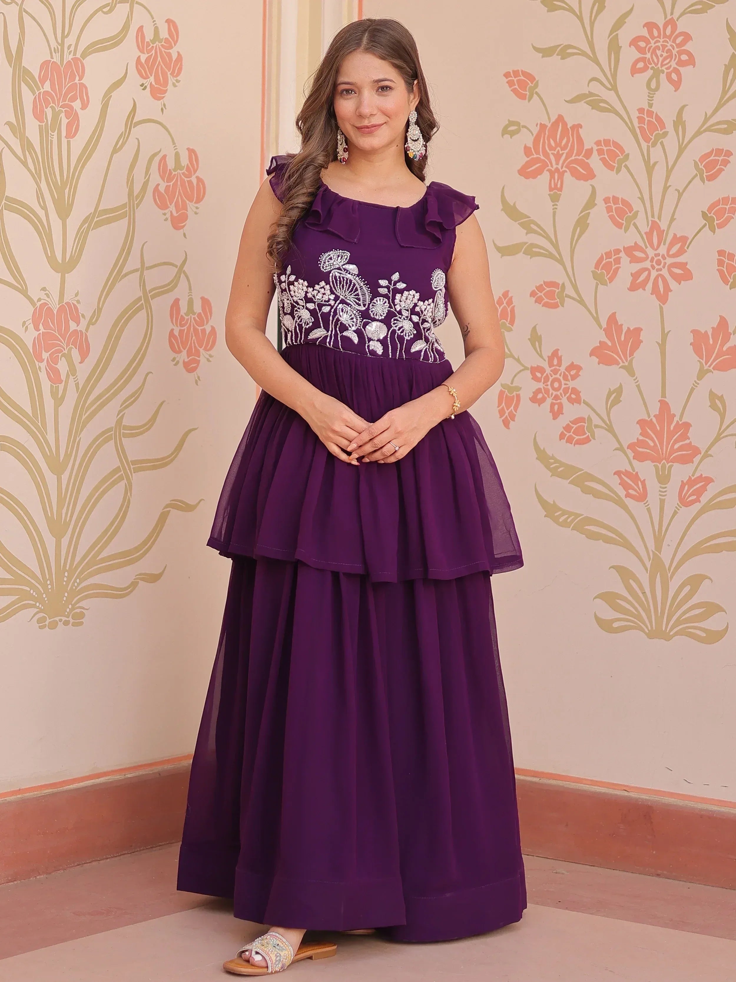 Purple ethnic gown with floral embroidery and ruffle sleeves, perfect for Indian occasions