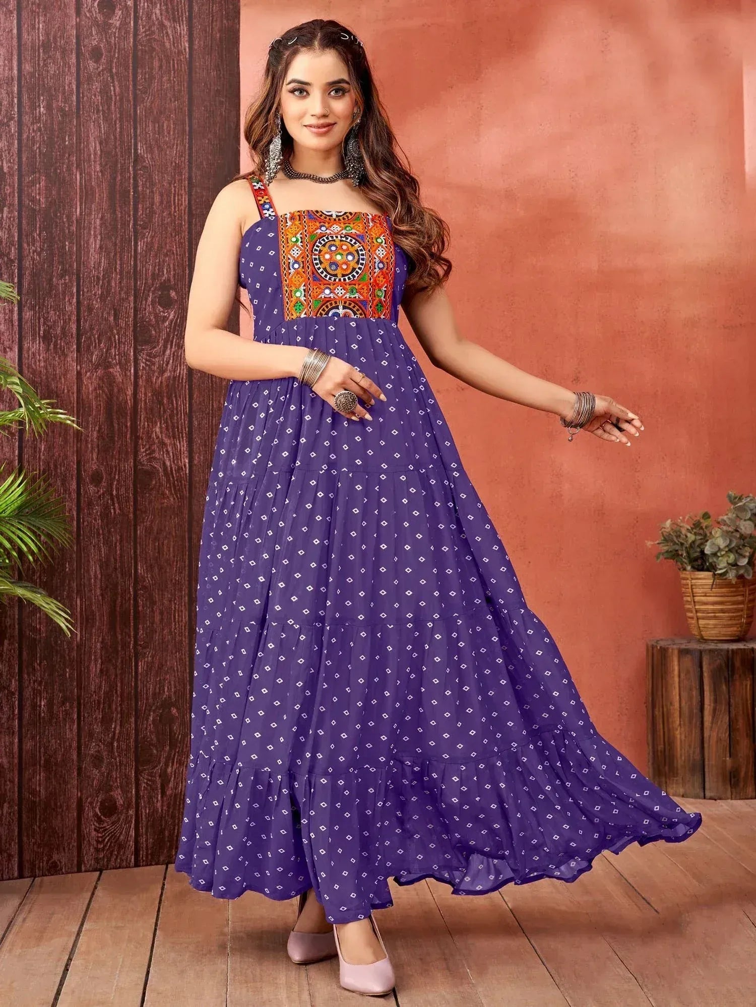 Purple ethnic gown with colorful embroidered bodice and diamond print, perfect for festive occasions