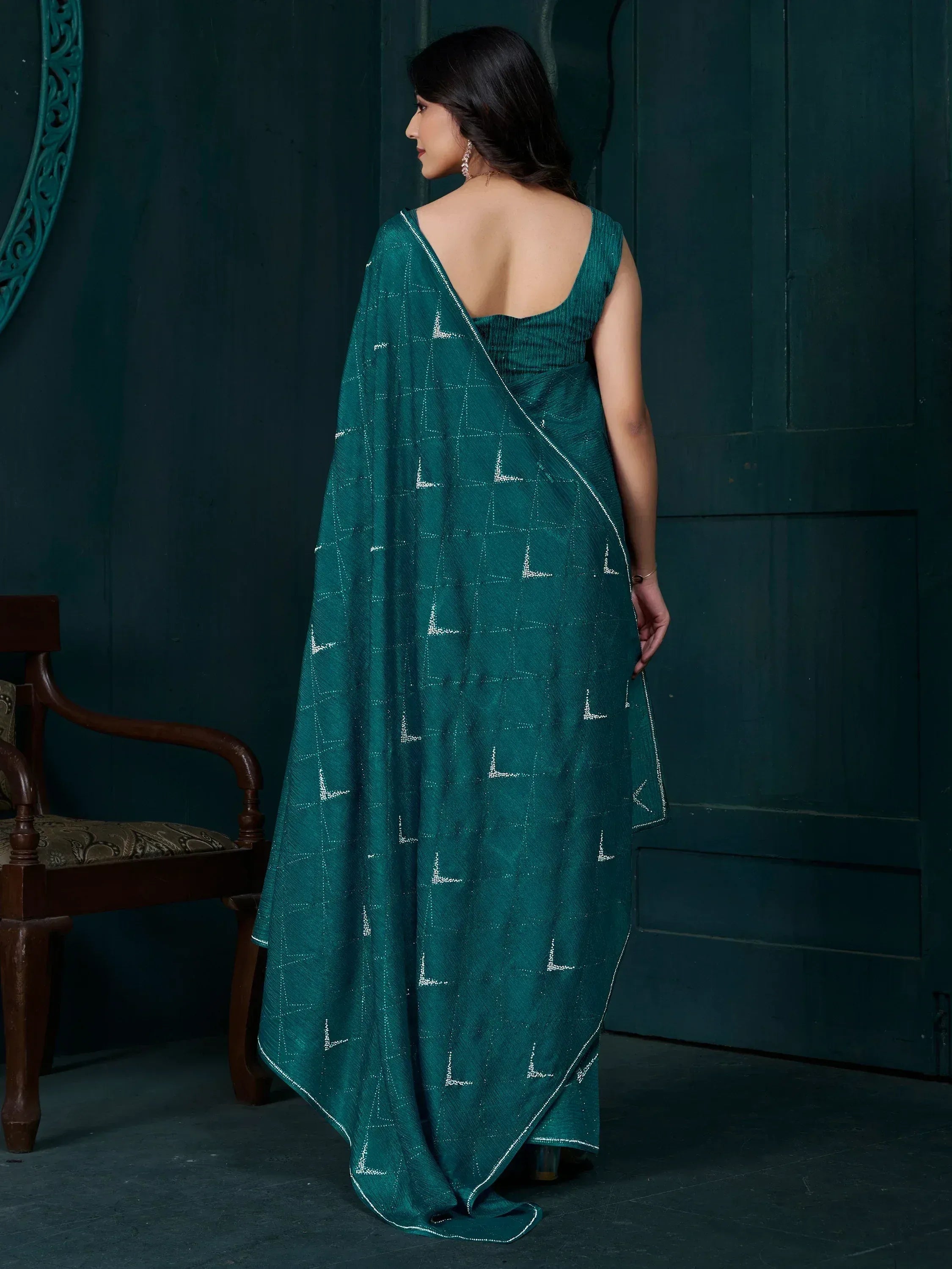 Emerald green saree with white geometric embroidery, back view, ethnic wear