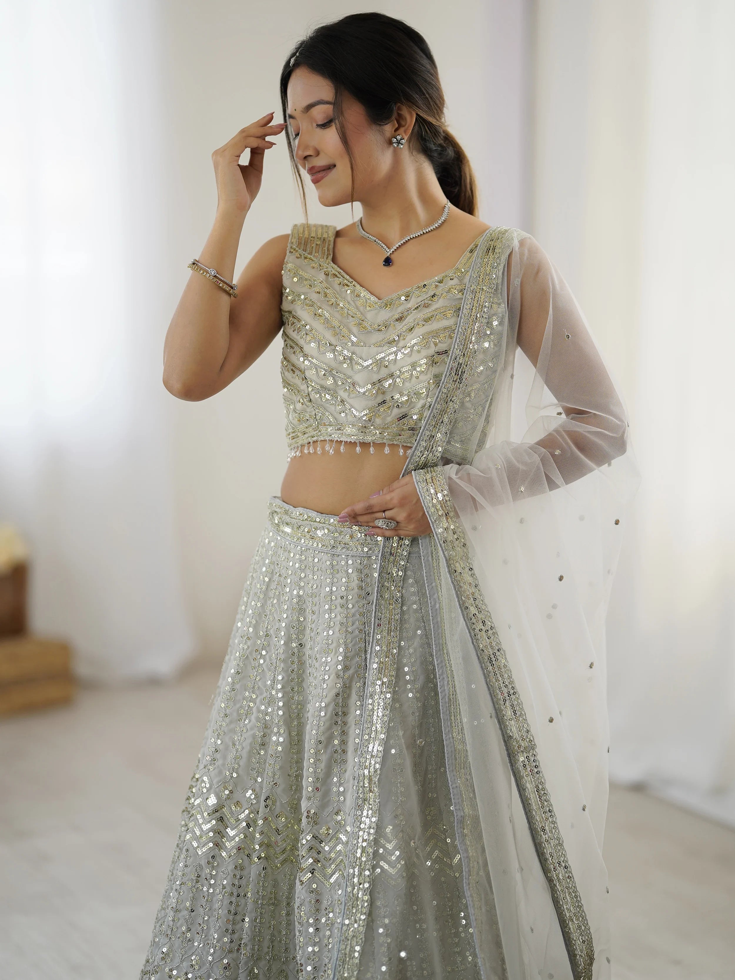Luxurious Off White Georgette Sequins Bridemaids Lehenga Choli - Ethnic Plus In