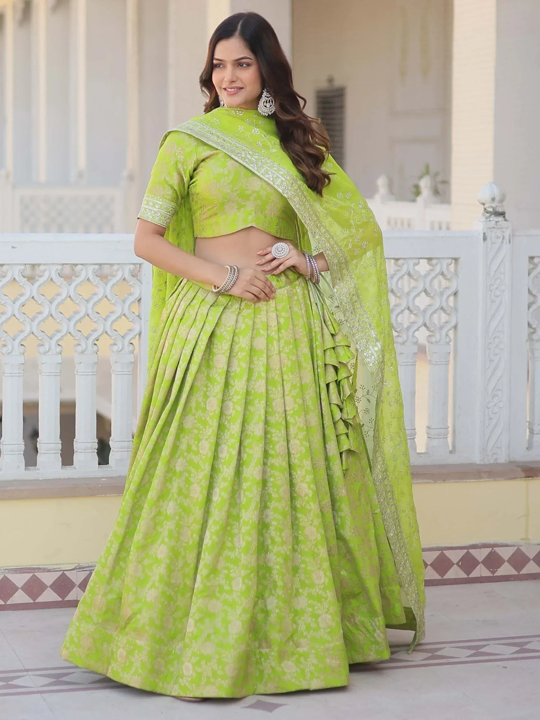 Lime green floral lehenga choli with ruffled skirt and embroidered dupatta, perfect for Indian ethnic wear occasions
