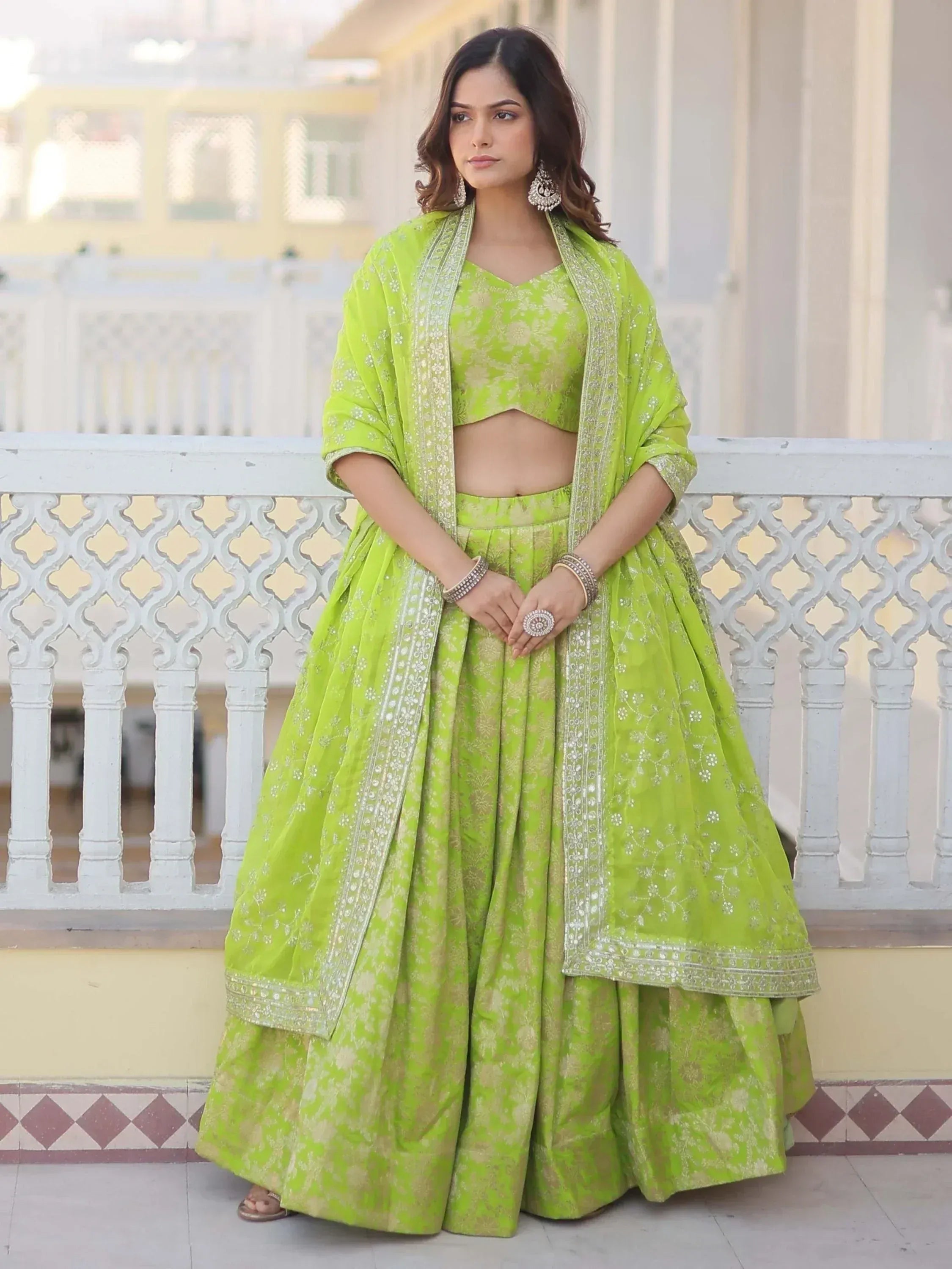 Vibrant green designer lehenga choli with floral embroidery and dupatta, perfect for Indian ethnic occasions
