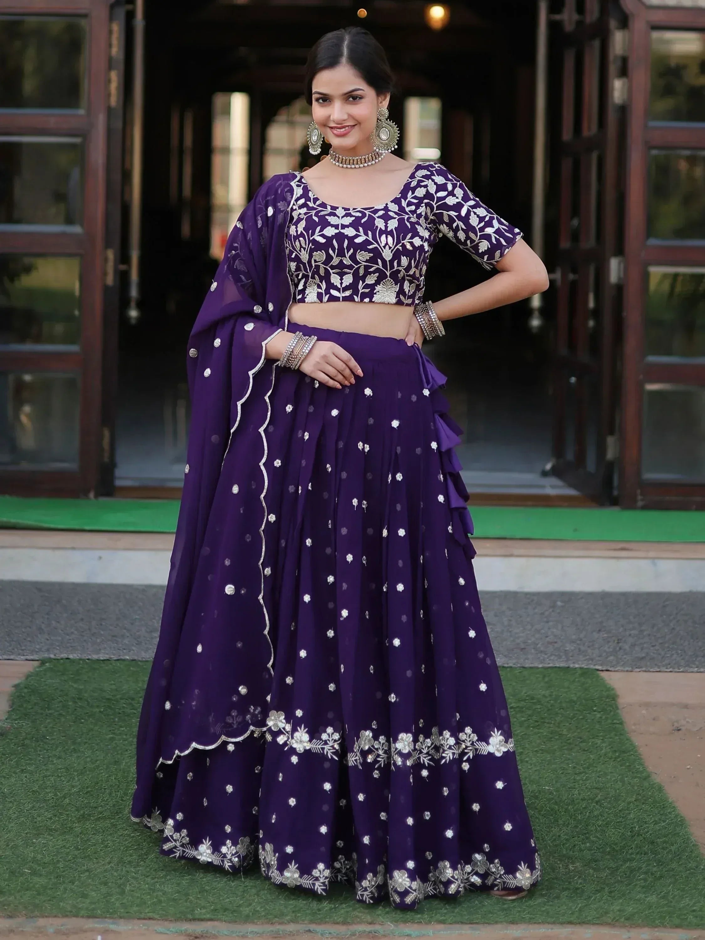 Purple embroidered lehenga choli with floral zari work, perfect for Indian ethnic occasions