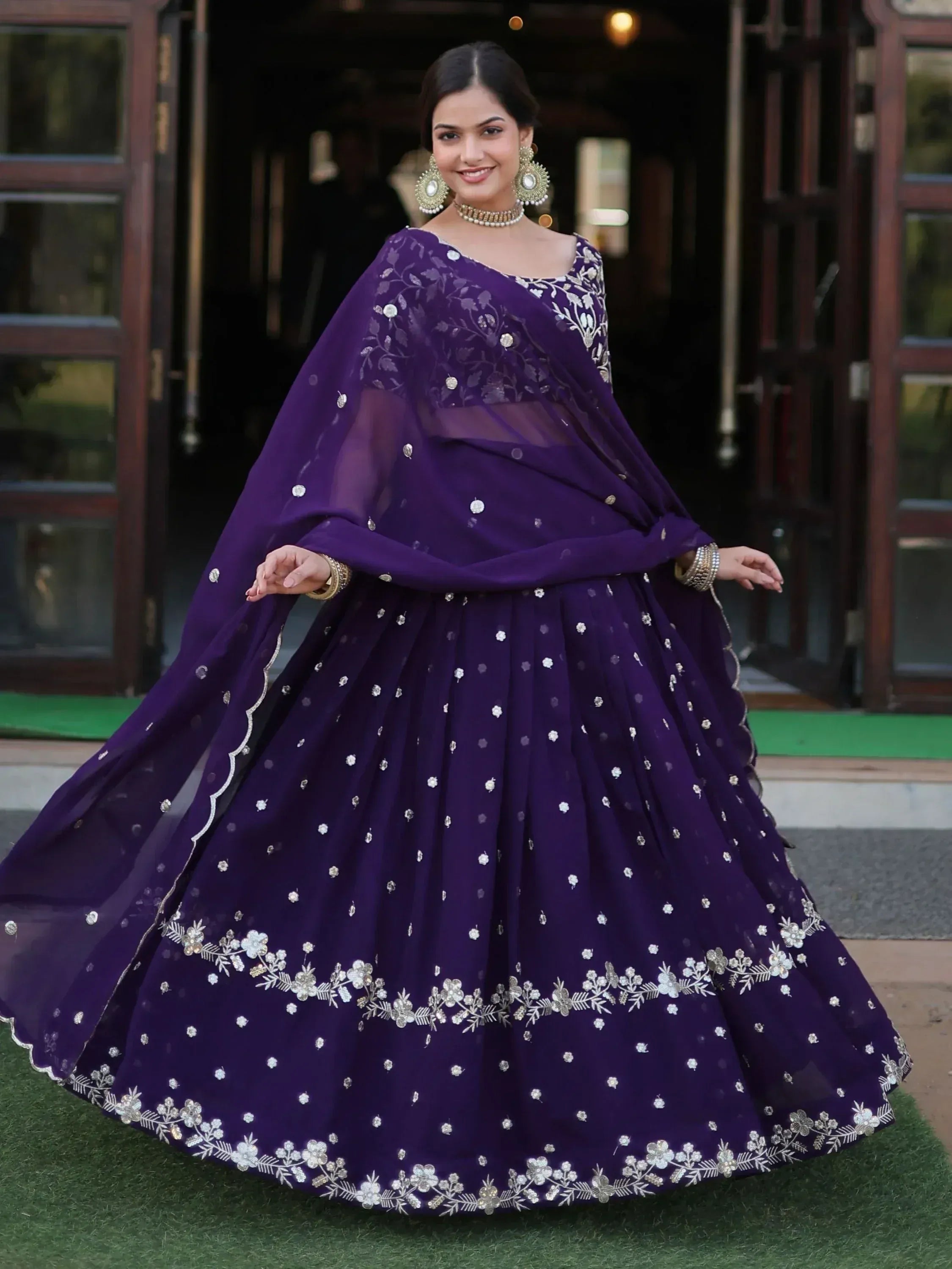 Purple designer lehenga choli with floral embroidery, perfect for Indian ethnic wear events