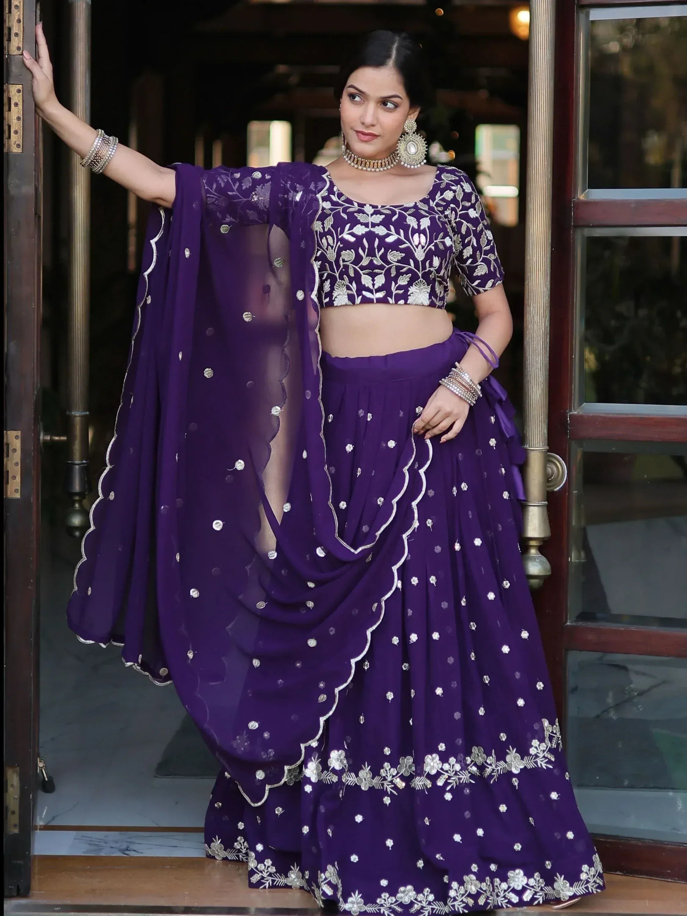 Purple embroidered lehenga choli with floral work, perfect for Indian ethnic wear events