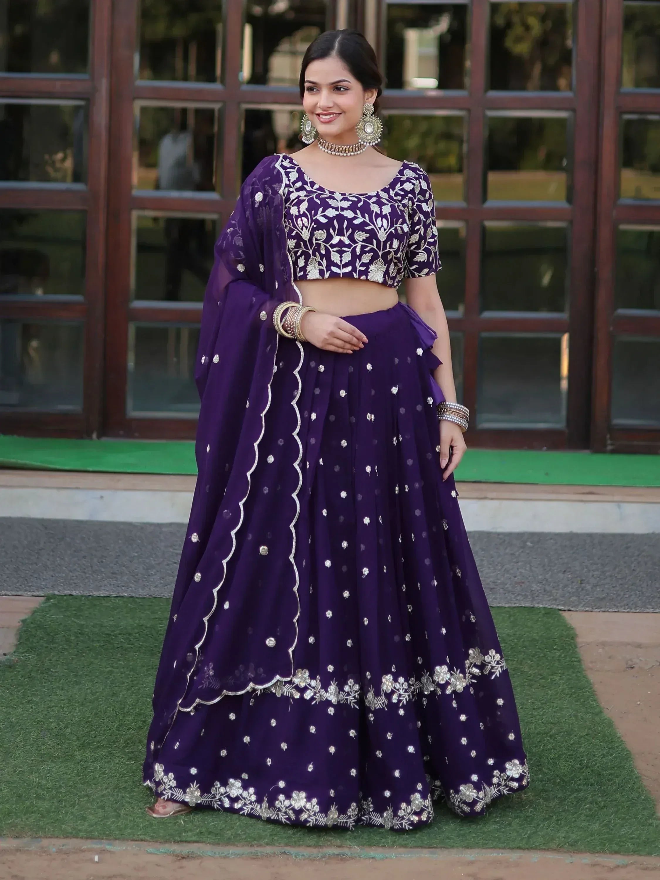 Purple embroidered lehenga choli with floral zari work, perfect for Indian ethnic occasions