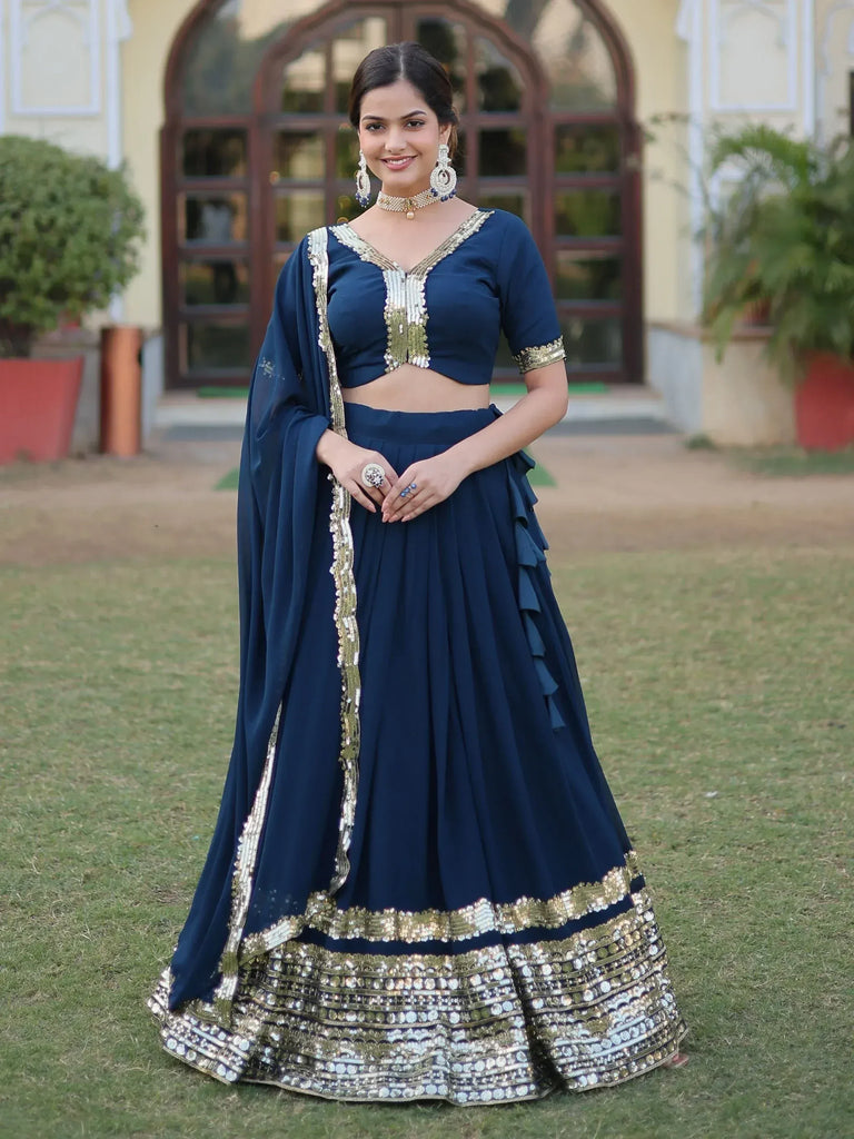 Navy blue designer lehenga choli with gold embroidery, perfect for Indian ethnic wear occasions
