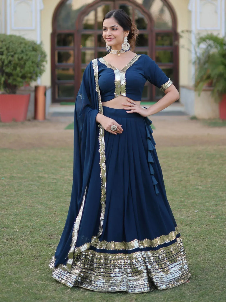 Navy blue designer lehenga choli with gold embroidery, perfect for Indian ethnic wear occasions