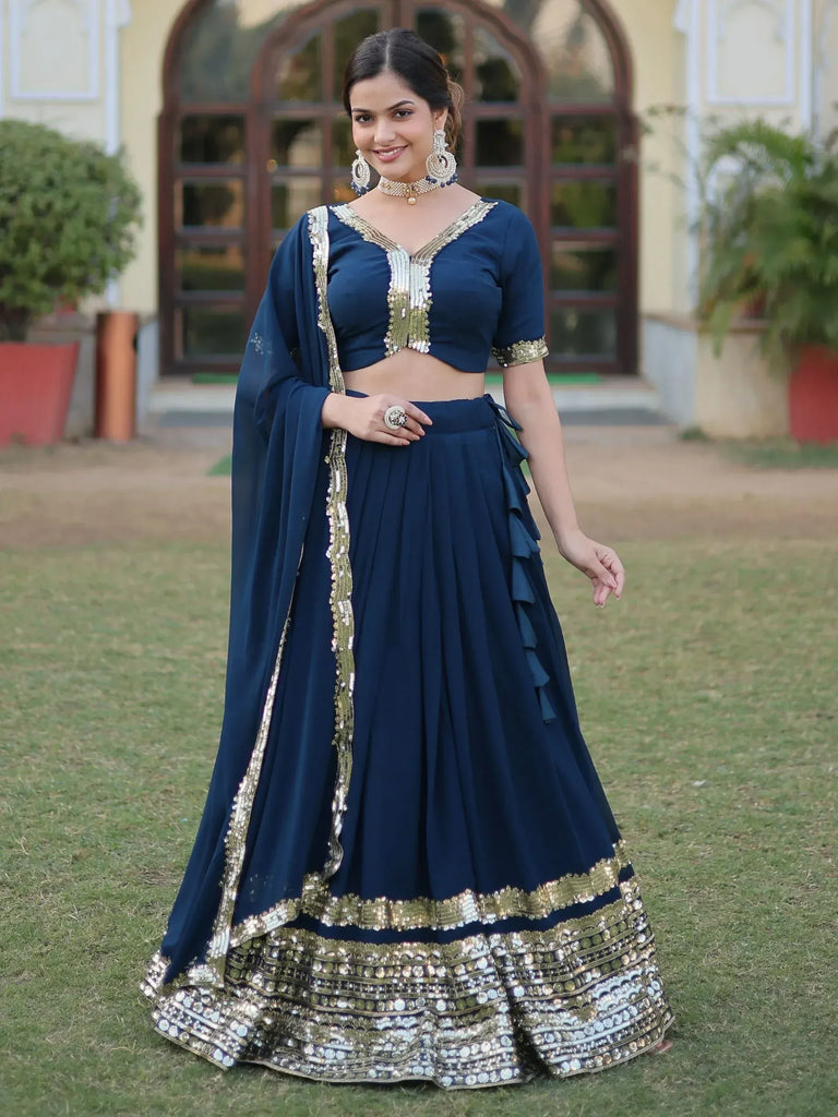 Navy blue designer lehenga choli with gold embroidery, perfect for Indian ethnic wear occasions