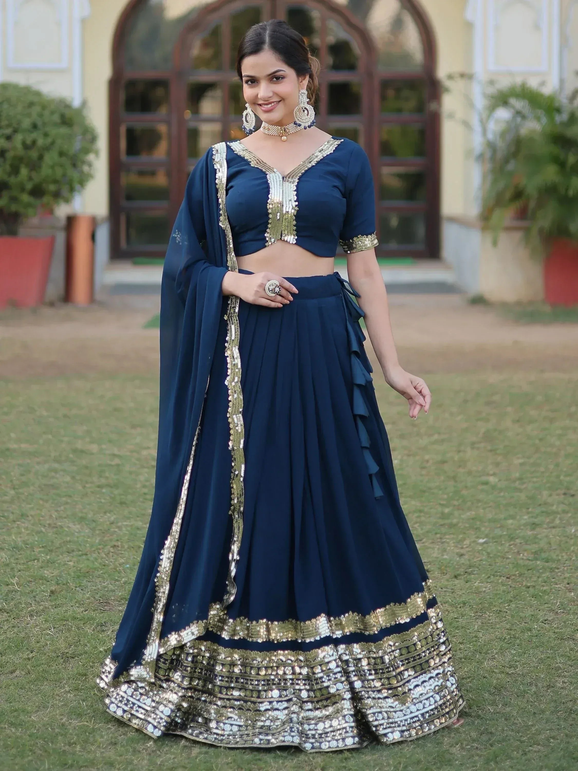 Navy blue designer lehenga choli with gold embroidery, perfect for Indian ethnic wear occasions