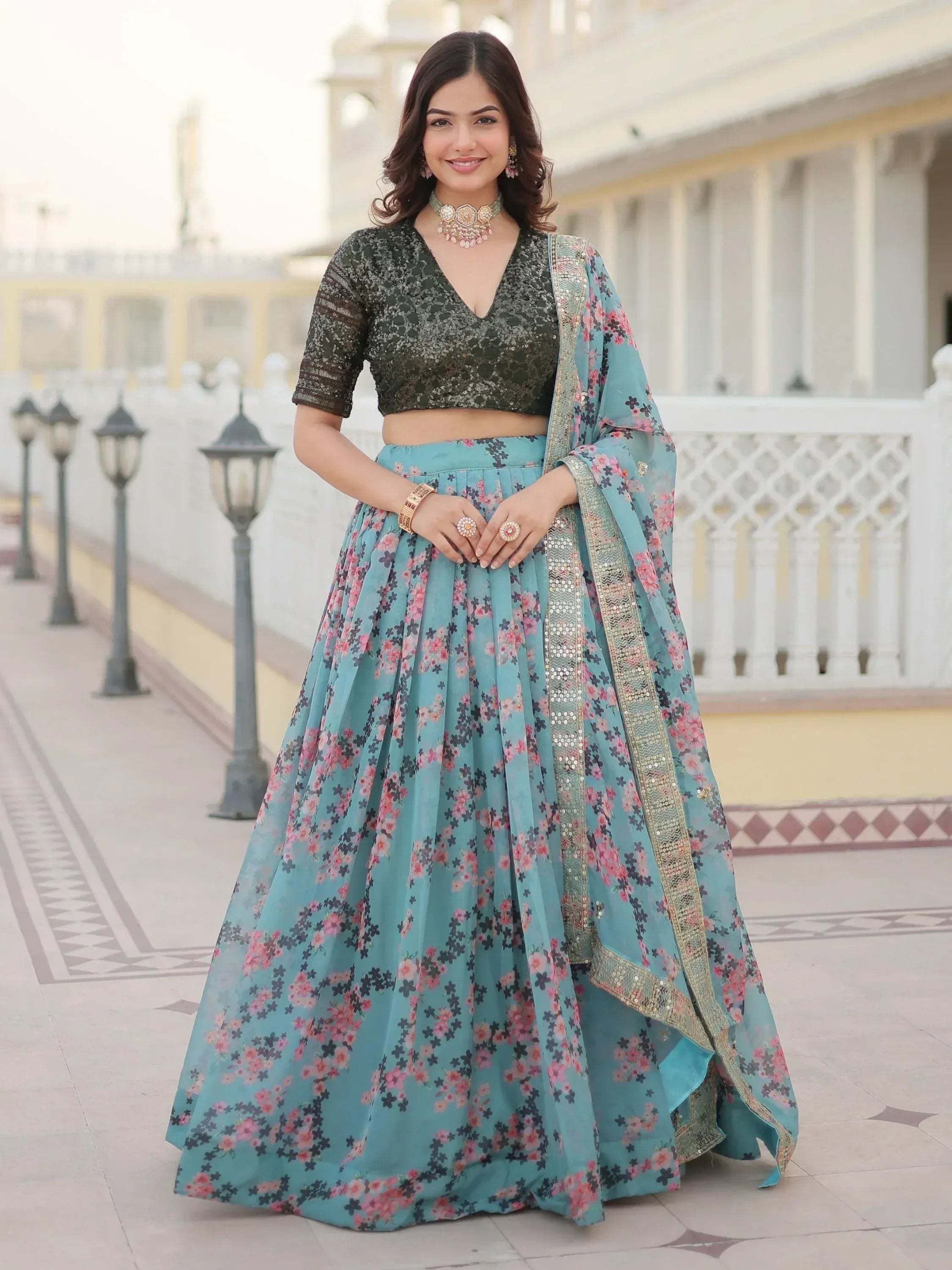 Woman in floral lehenga choli with sequin blouse, perfect for Indian ethnic wear occasions