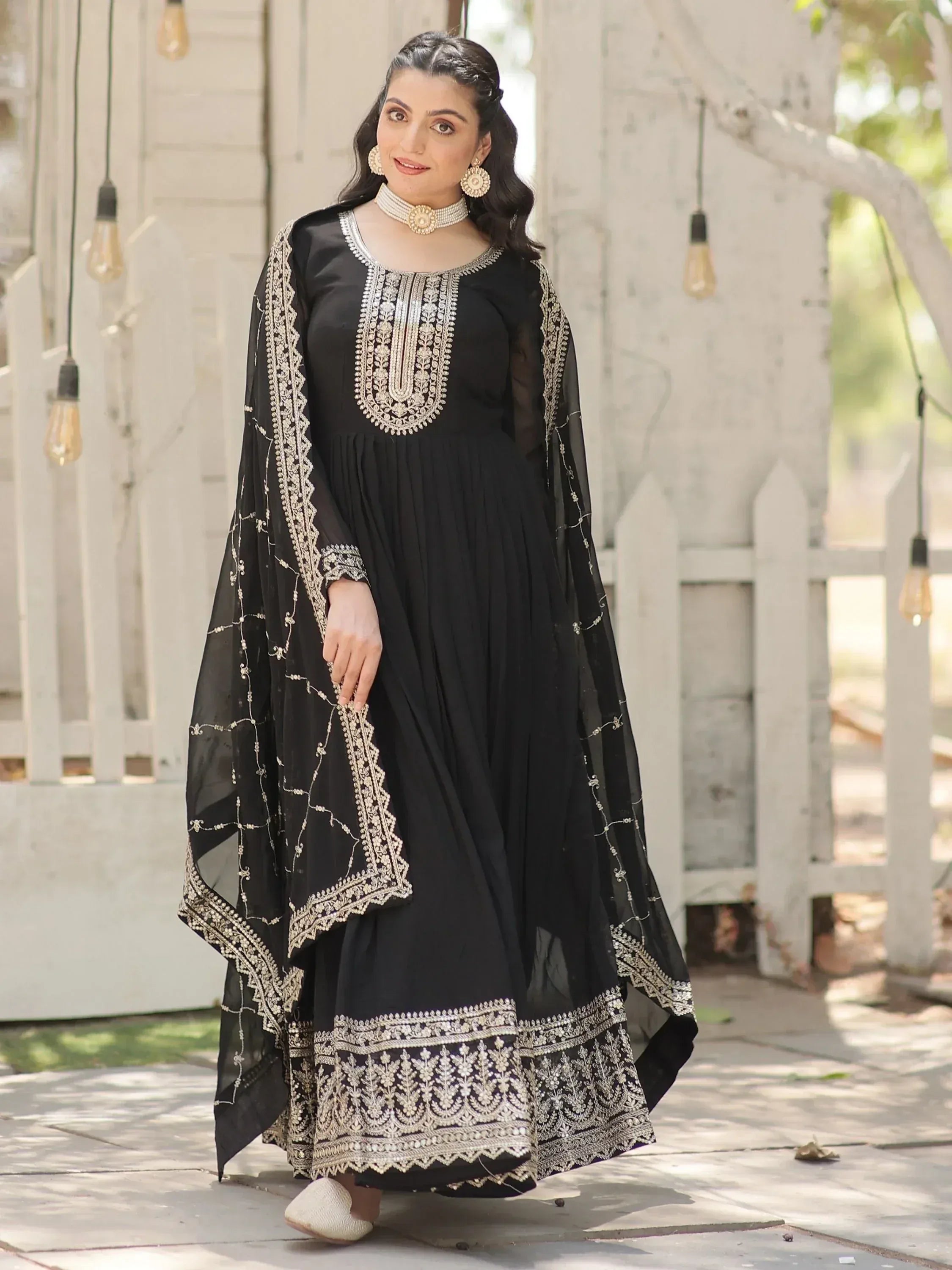 Black embroidered anarkali with gold detailing, perfect for Indian ethnic wear occasions