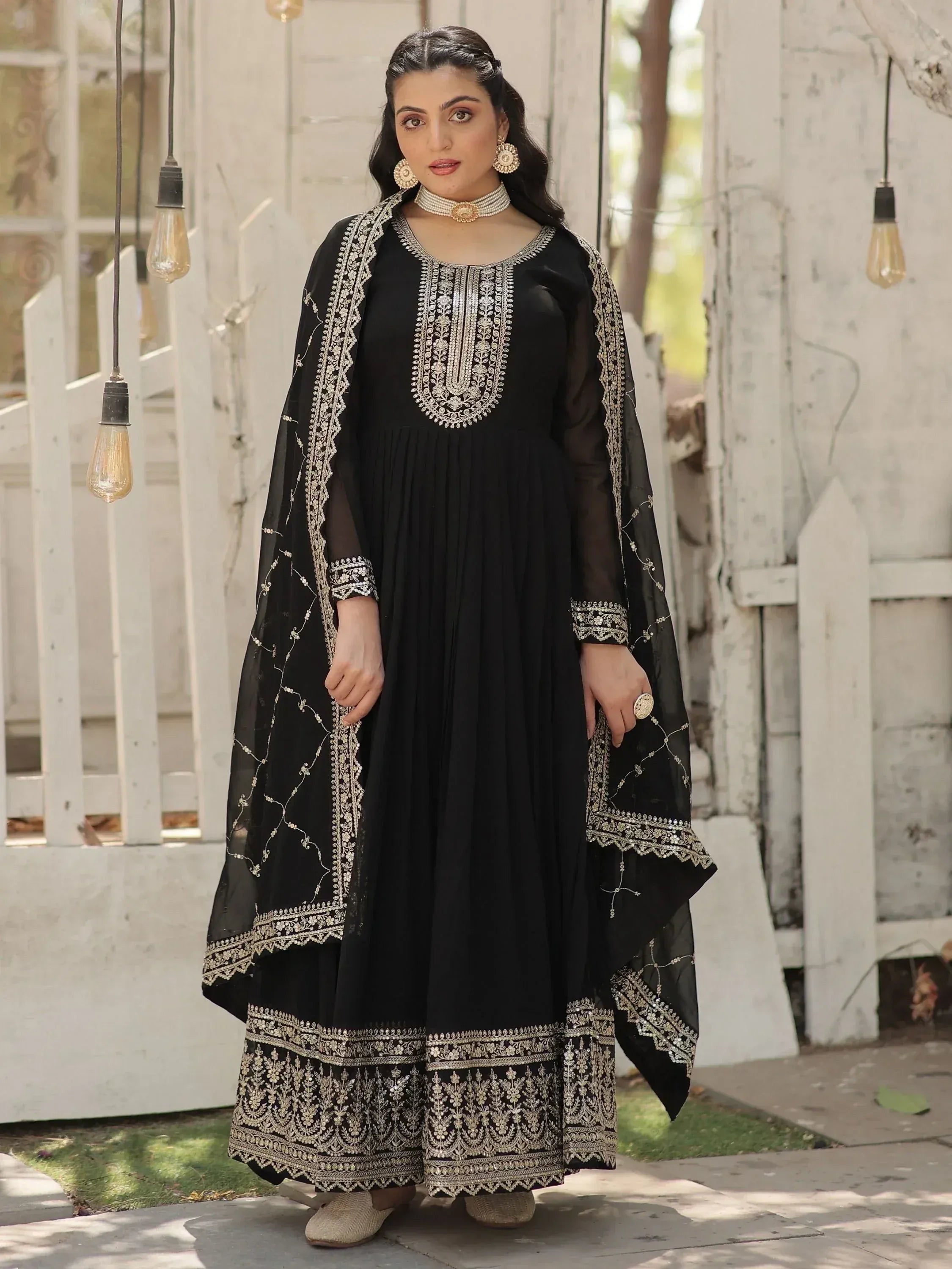 Black embroidered anarkali suit with gold detailing, perfect for Indian ethnic wear occasions