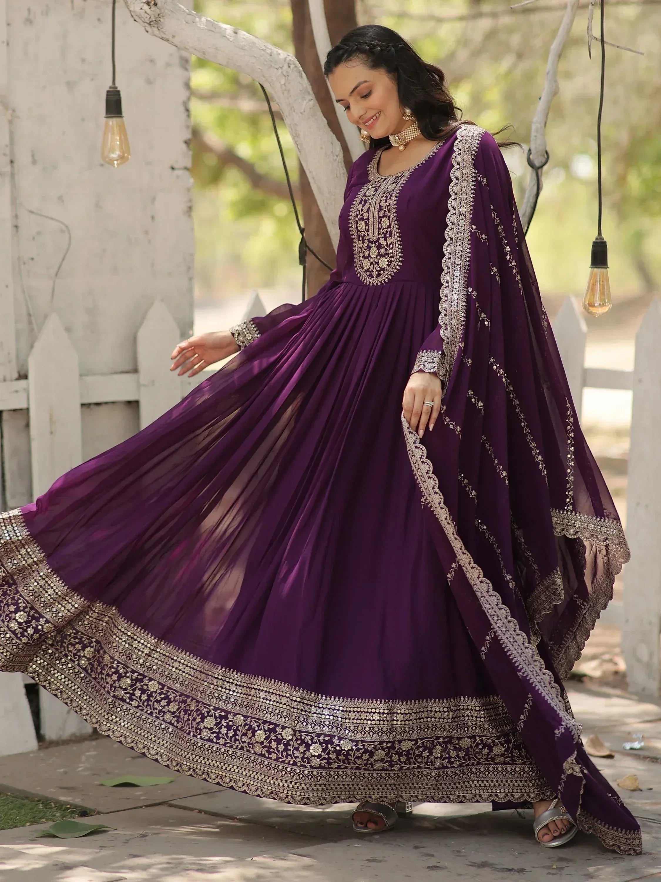 Purple embroidered anarkali gown with gold detailing, perfect for Indian ethnic occasions