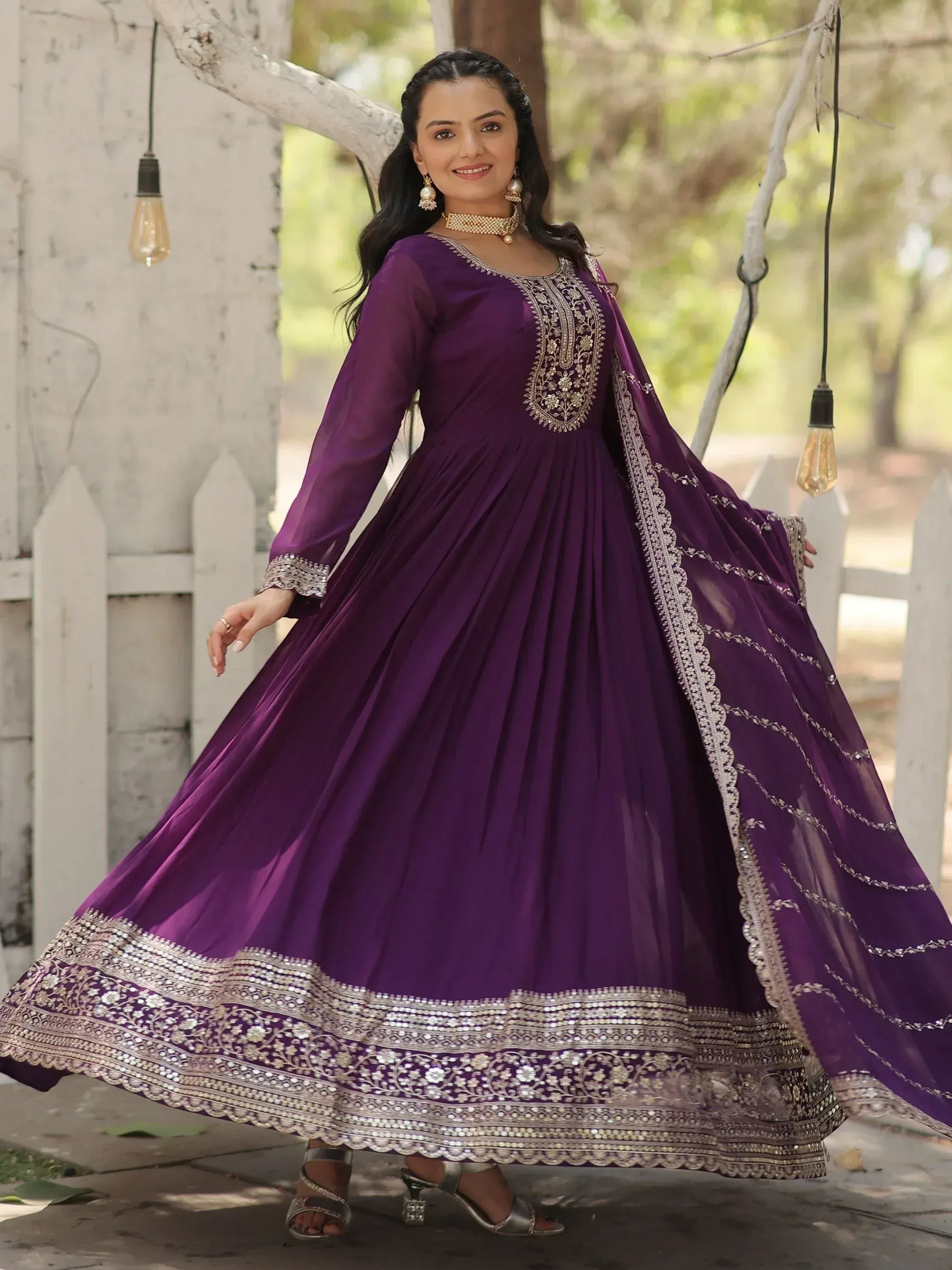 Purple embroidered anarkali gown with gold detailing, perfect for Indian ethnic occasions