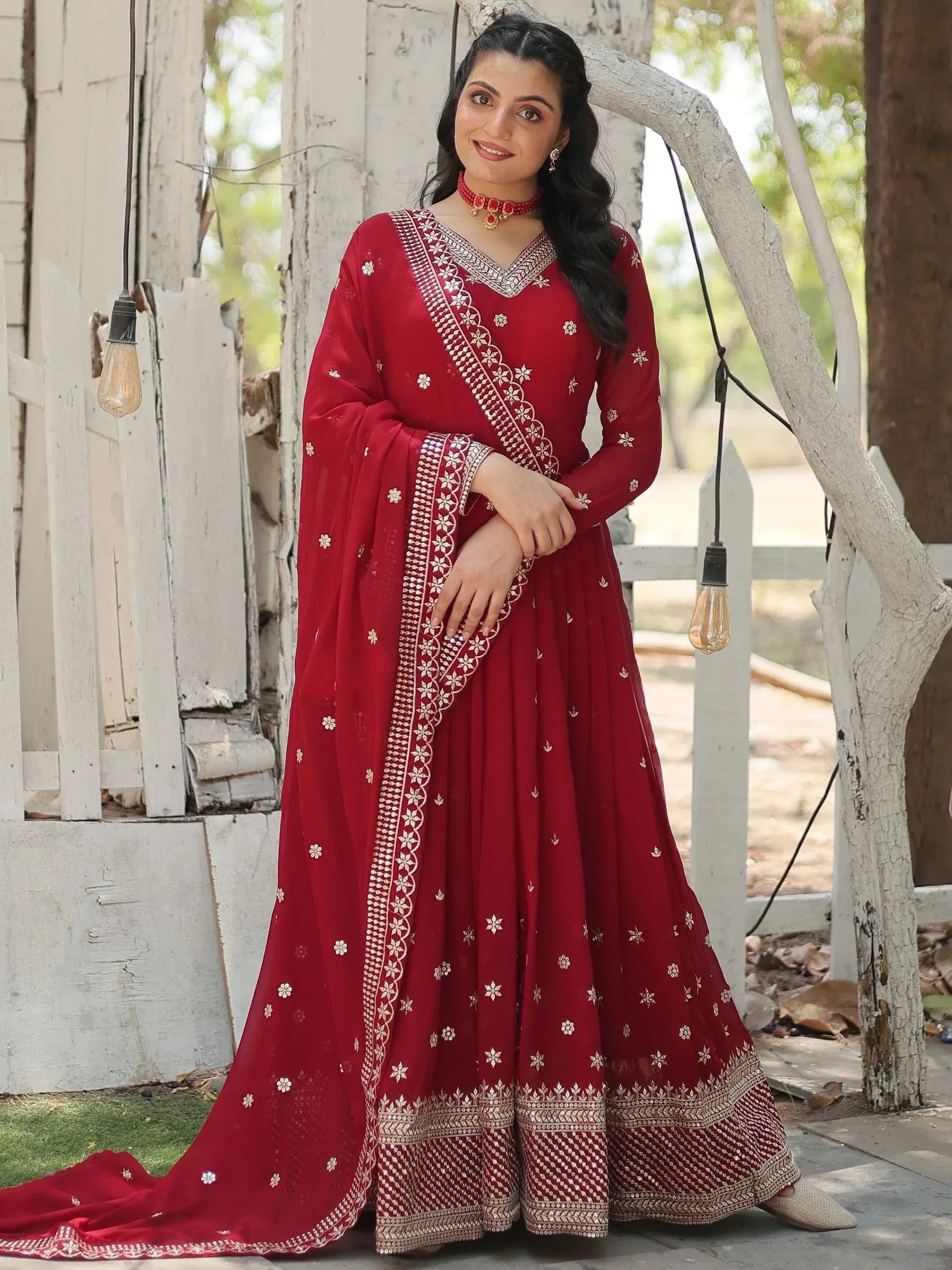 Red embroidered anarkali suit with gold detailing, perfect for Indian ethnic wear occasions