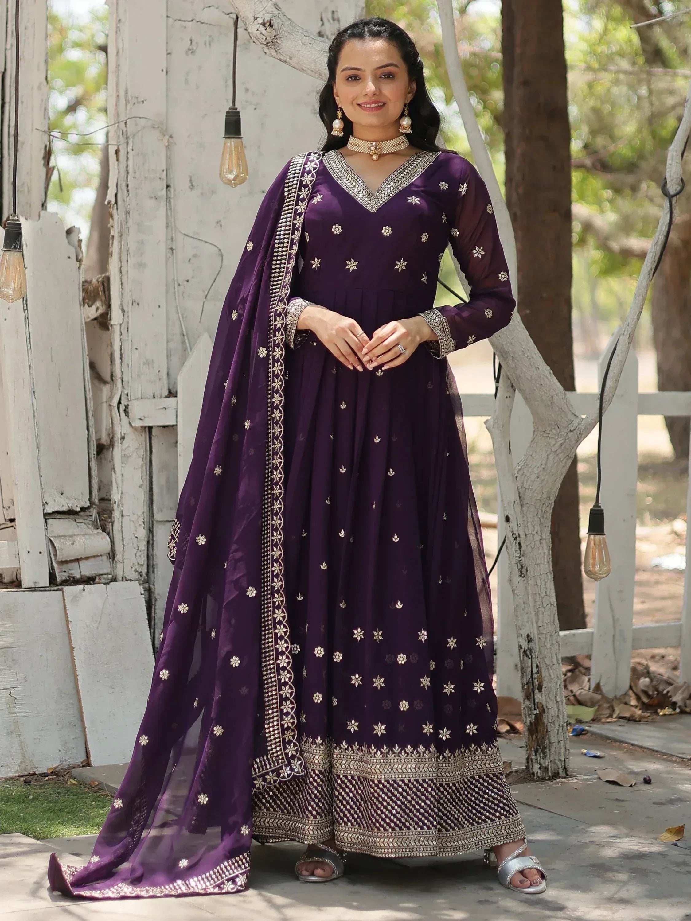 Purple embroidered anarkali suit with gold detailing, perfect for Indian ethnic wear occasions