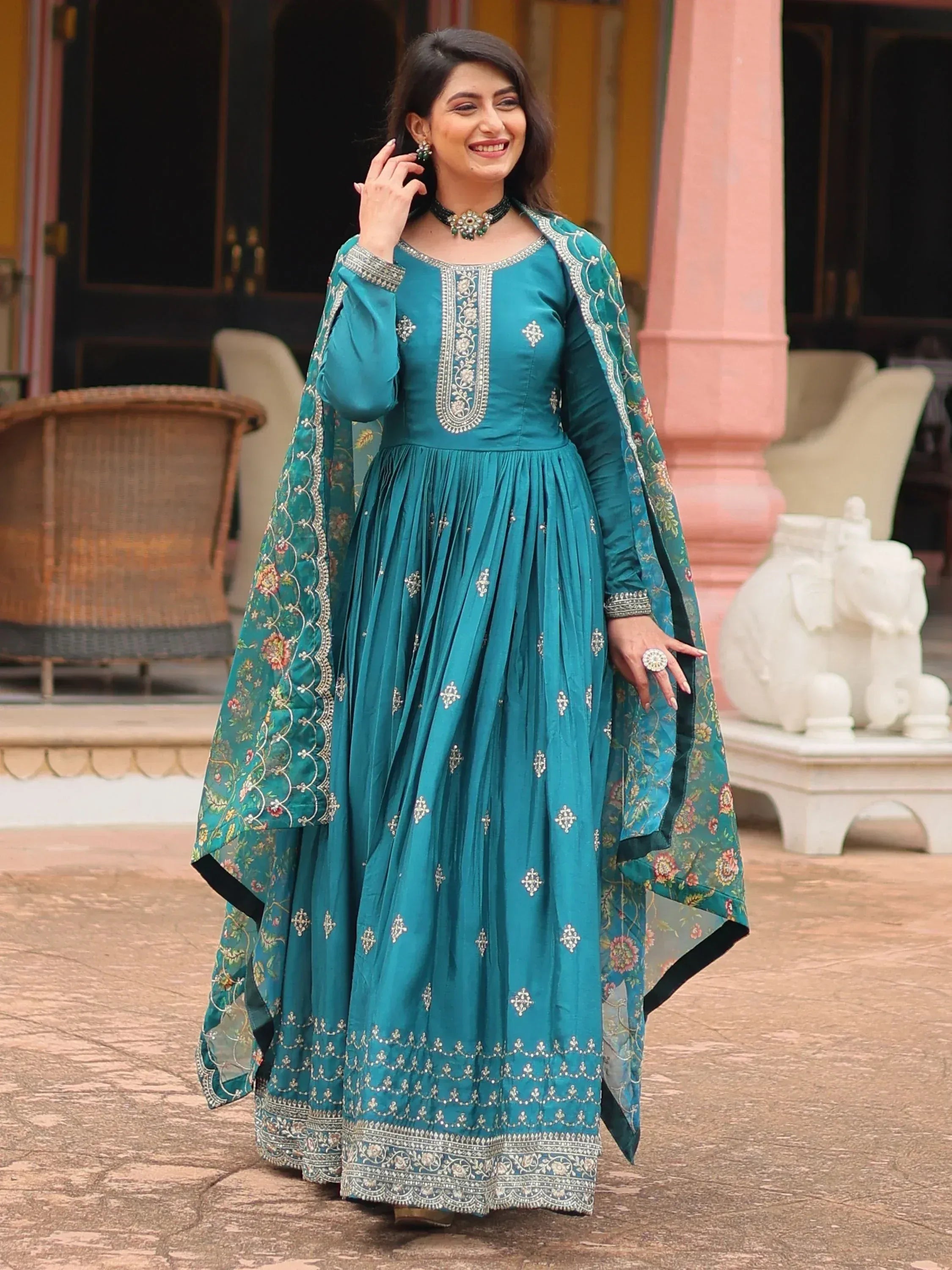 Teal embroidered anarkali suit with floral dupatta, perfect for Indian ethnic occasions