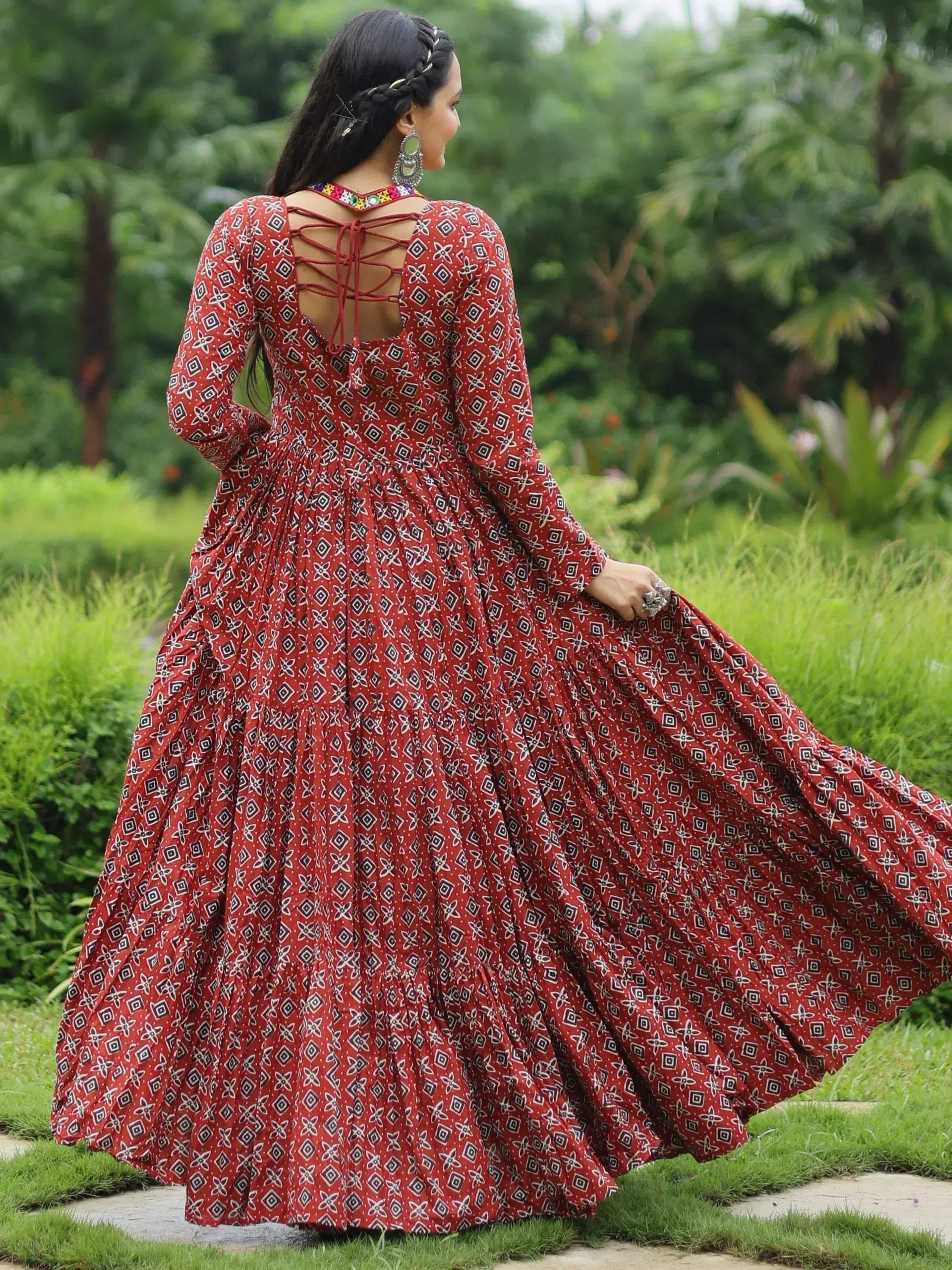 Red printed ethnic gown with back lace-up detail, perfect for Indian occasions
