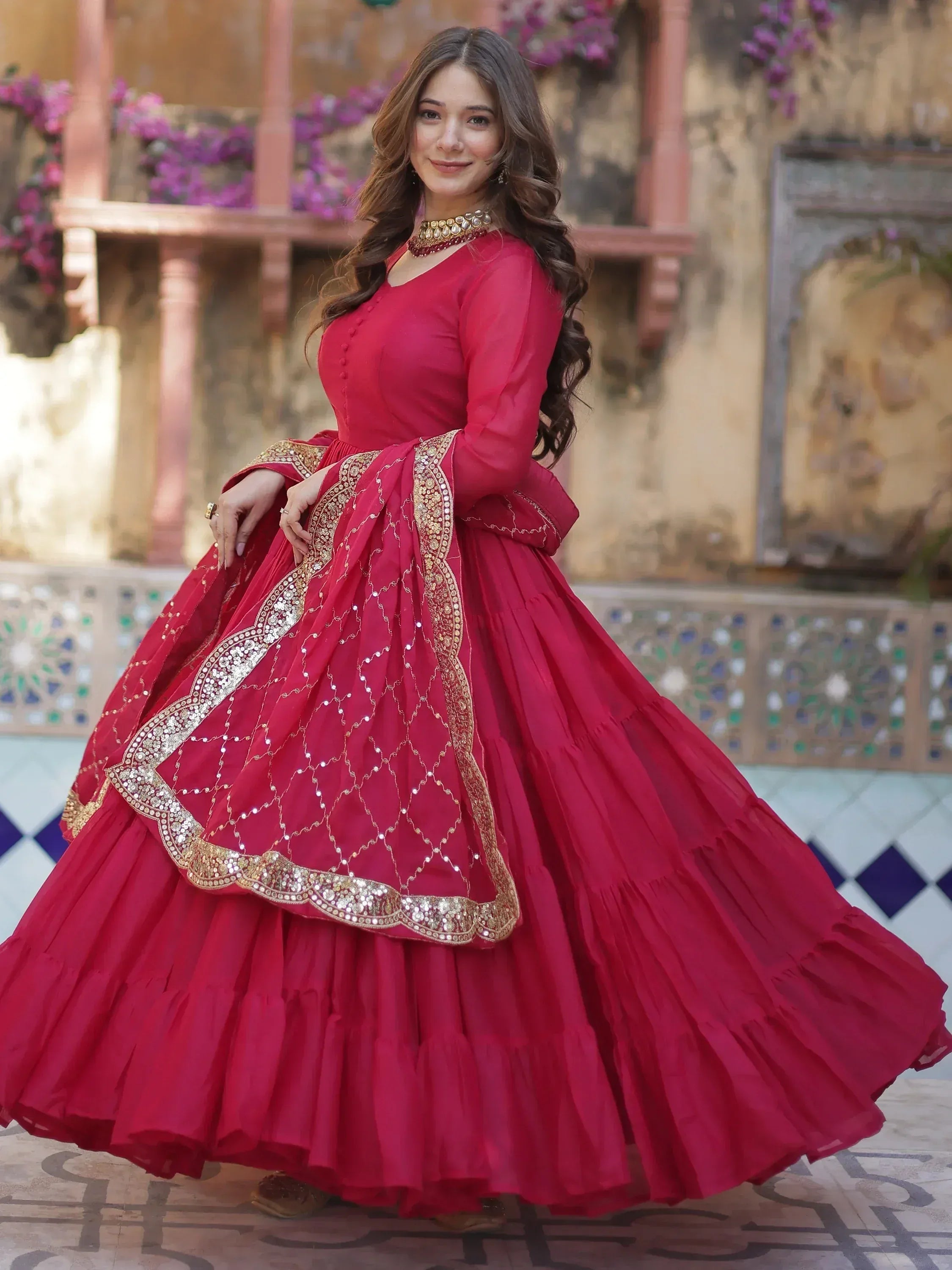 Red designer lehenga choli with gold embroidery, perfect for Indian ethnic wear occasions