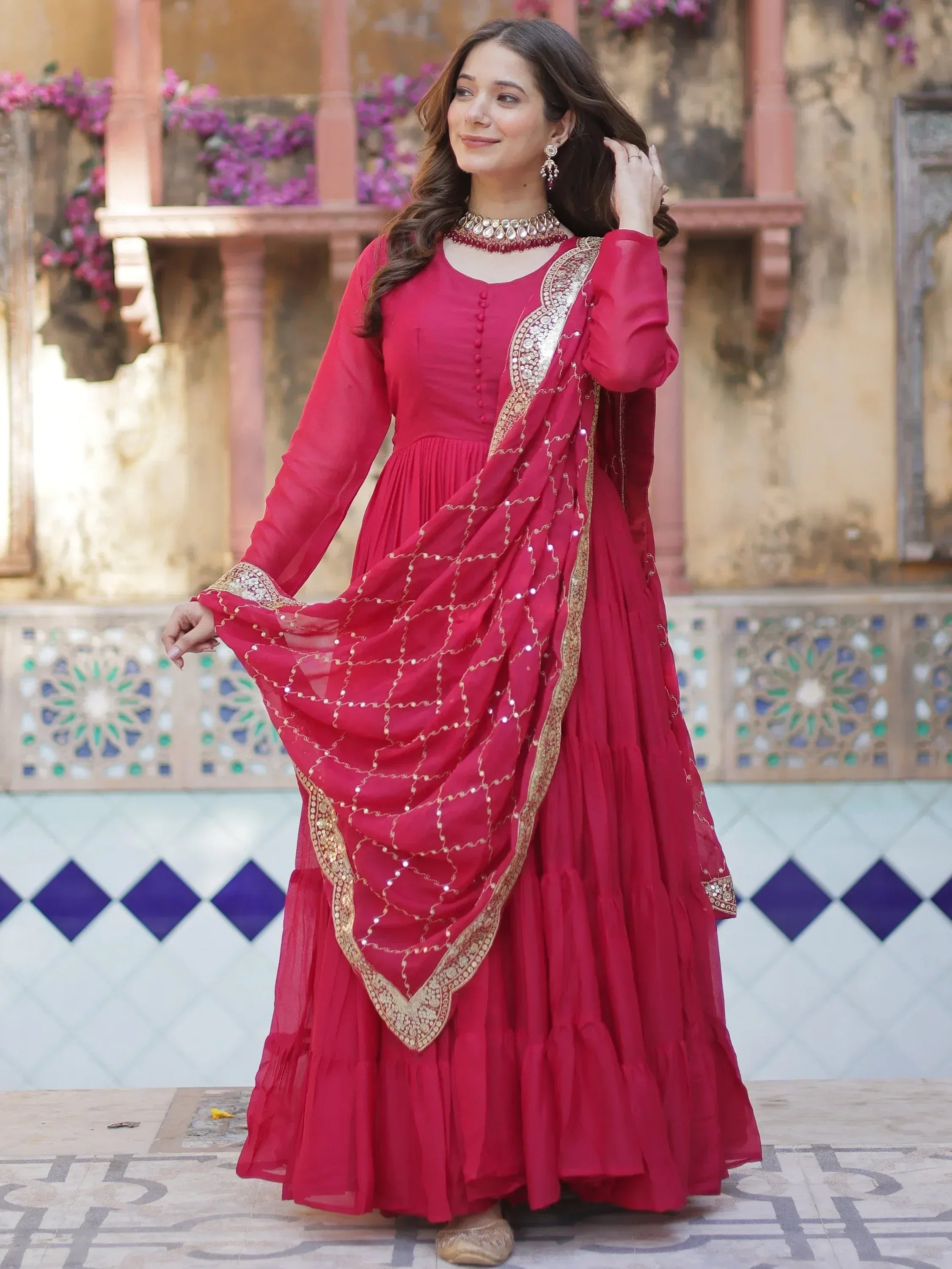 Red ethnic anarkali suit with gold embroidery and dupatta, perfect for Indian occasions